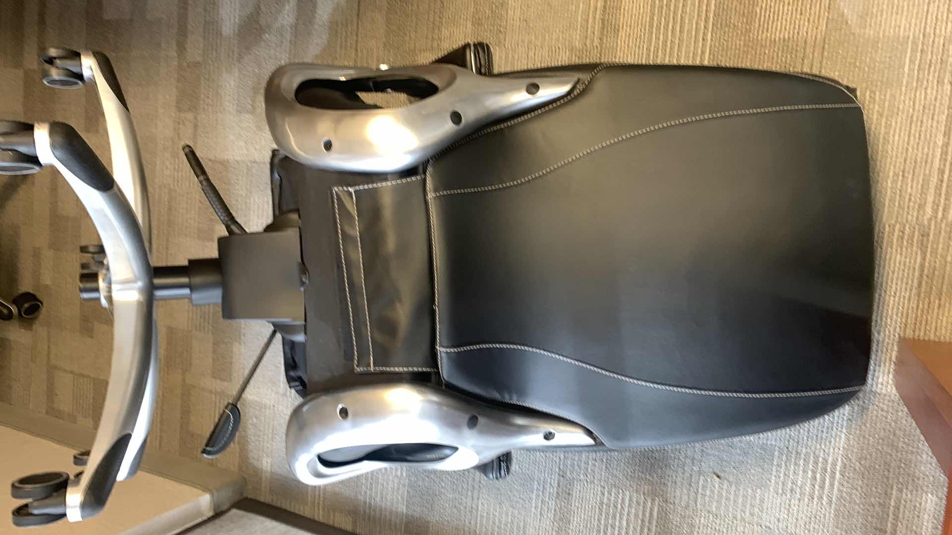 Photo 1 of TRUE INNOVATIONS BLACK BONDED LEATHER ADJUSTABLE ROTATING EXECUTIVE OFFICE CHAIR w WHEELS