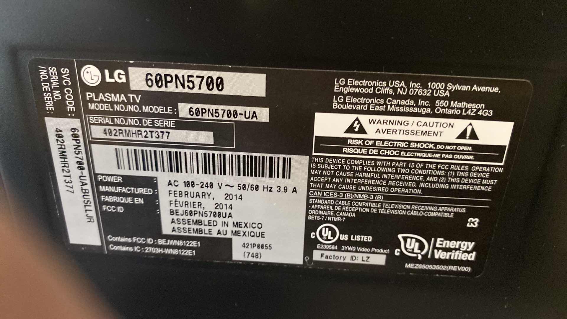 Photo 1 of LG 62” PLASMA TV WITH SWIVEL BASE AND REMOTES