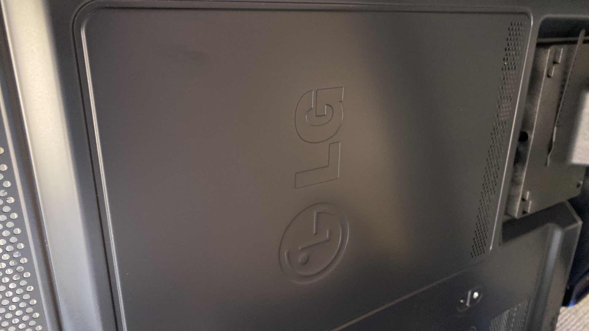 Photo 1 of LG 62” PLASMA TV WITH SWIVEL BASE AND REMOTES