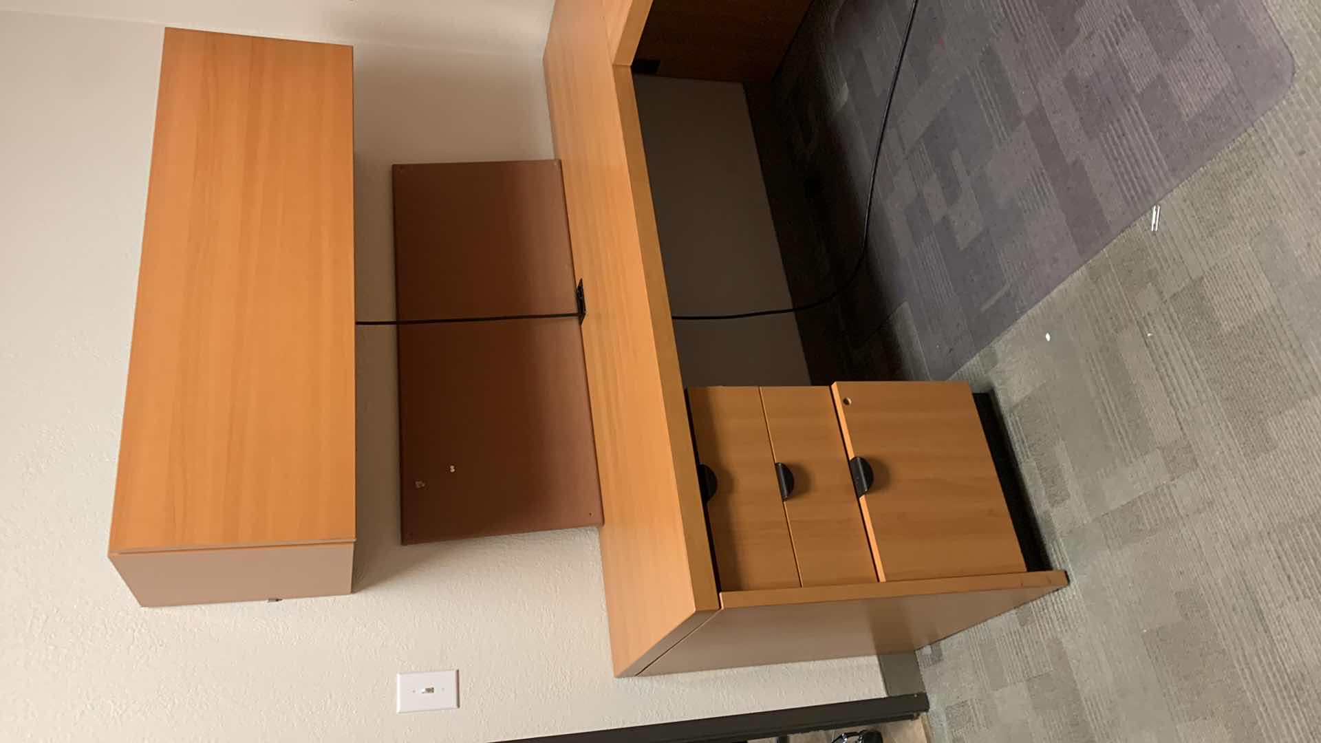 Photo 1 of MAGNA DESIGN LAS VEGAS WOOD WORK STATION/ OFFICE CORNER DESK UNIT TWO LOWER DESKS  72” x 24 WITH FILE CABINETS, TWO SOUND BOARDS AND THREE UPPER CABINETS WITH LIGHTS AND METAL DIVIDERS