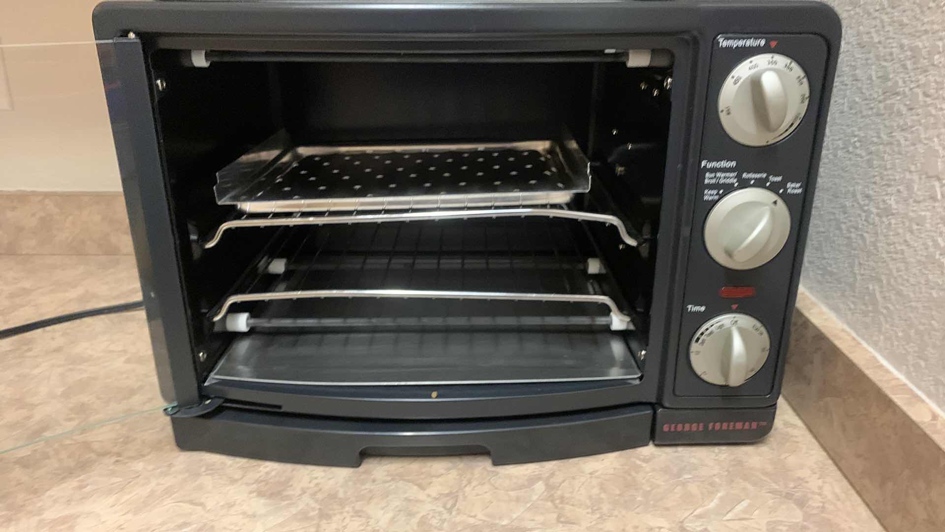 Photo 1 of GEORGE FOREMAN 8 in 1 OVEN/BROILER