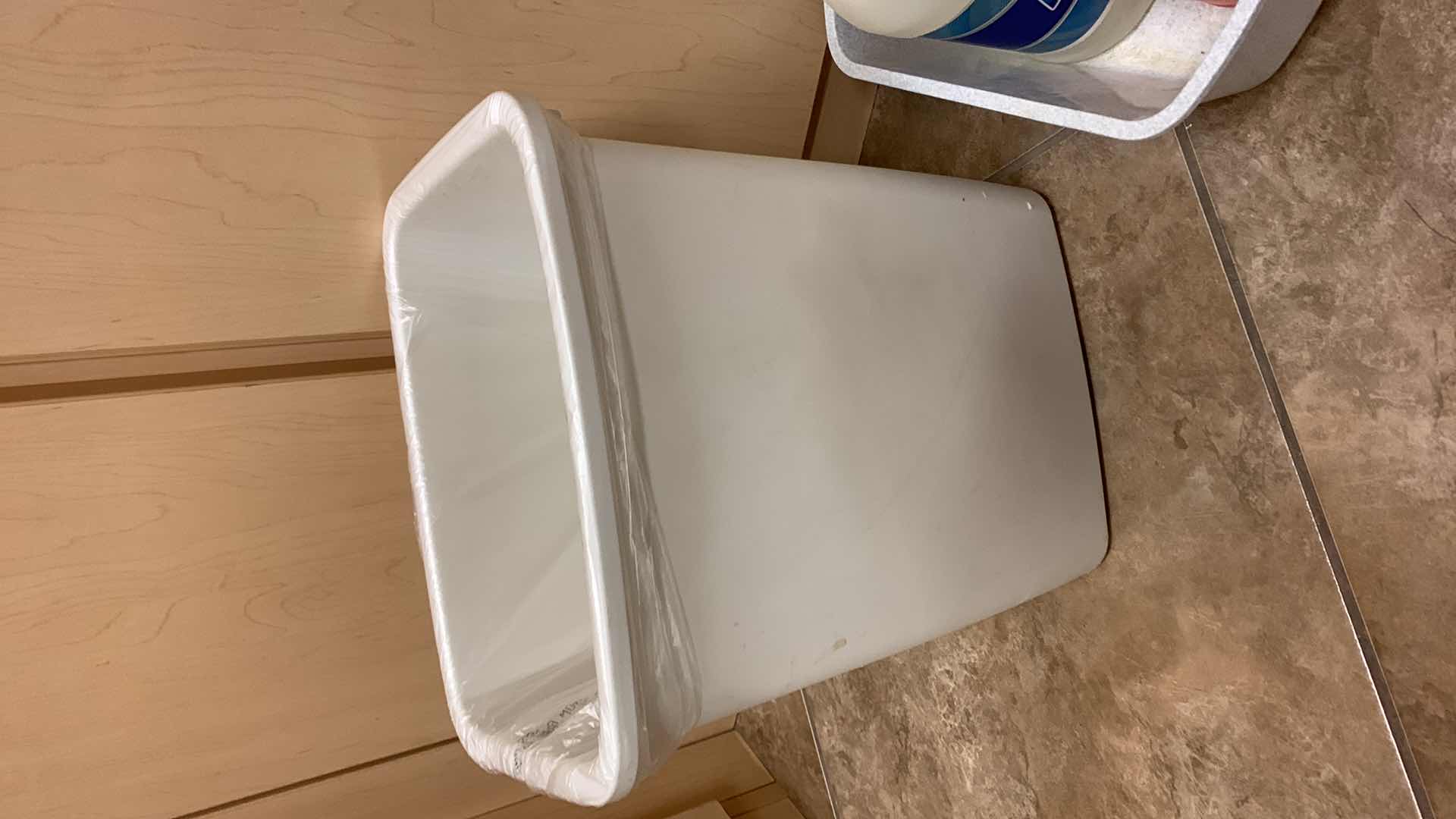 Photo 1 of CLEANING SUPPLIES AND WASTEBASKET