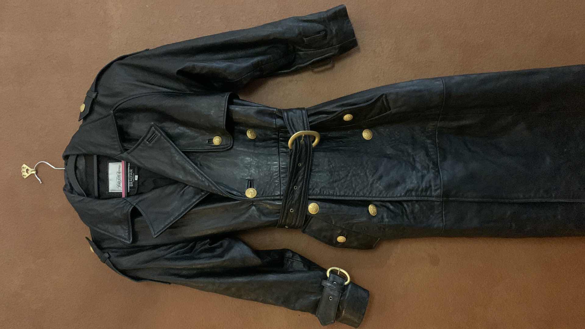 Photo 1 of SAKS FIFTH AVENUE BLACK LEATHER CALF LENGTH TRENCH COAT SIZE SMALL