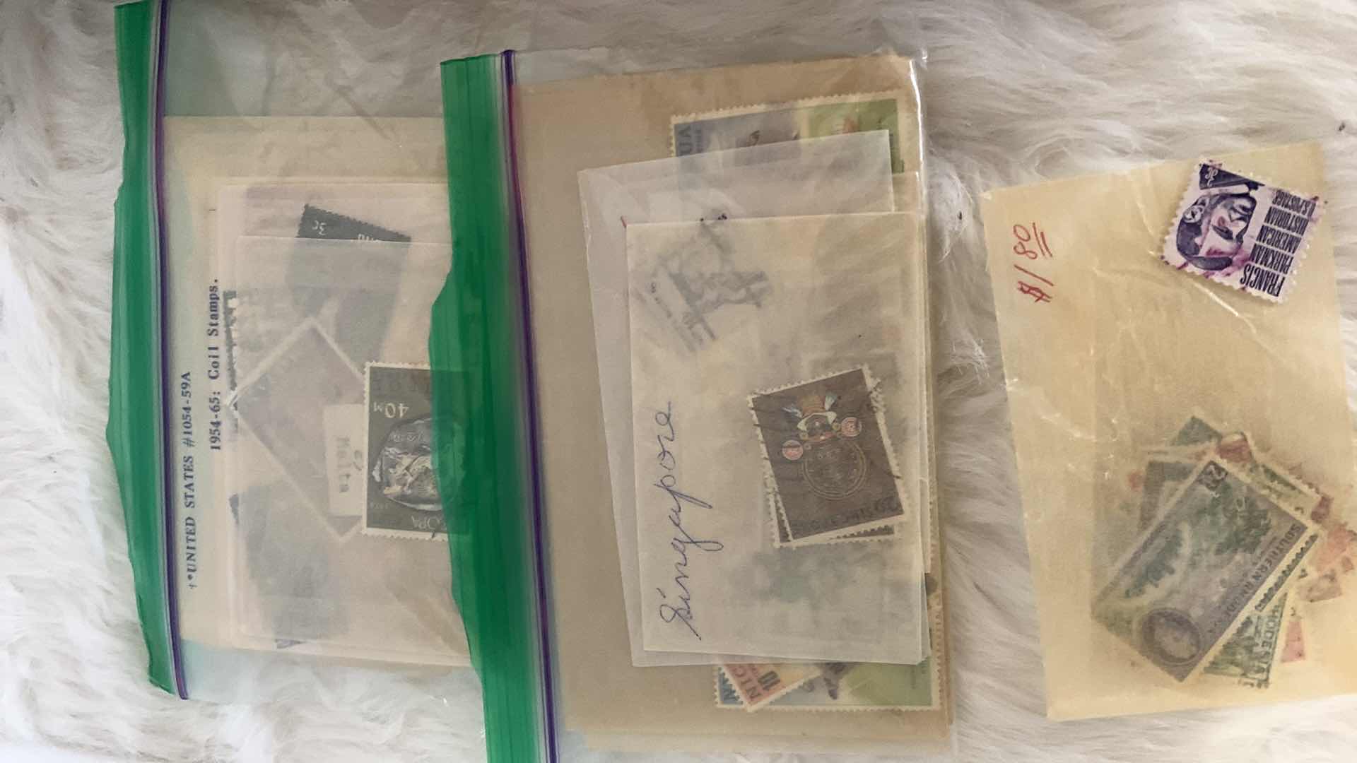 Photo 1 of STAMP COLLECTION IN CIGAR BOX