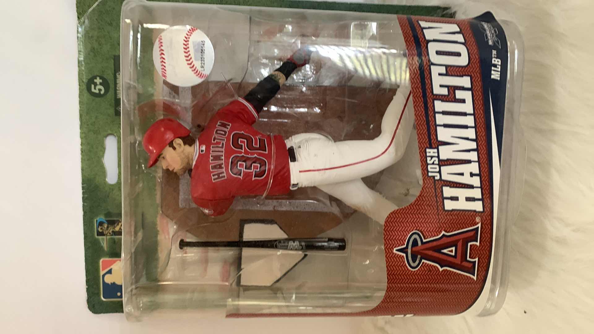 Photo 1 of ANGELS BASEBALL JERSEY SIZE XL AND NEW JOSH HAMILTON COLLECTIBLE FIGURINE