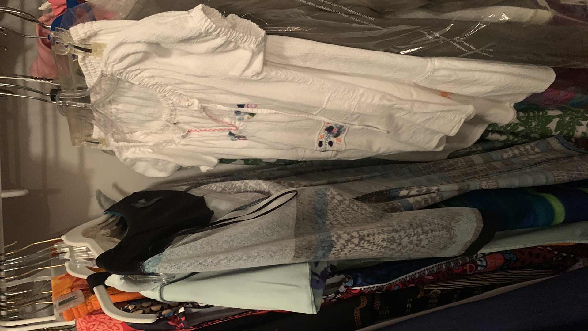 Photo 1 of RACK OF LADIES DRESSES SIZE L XL