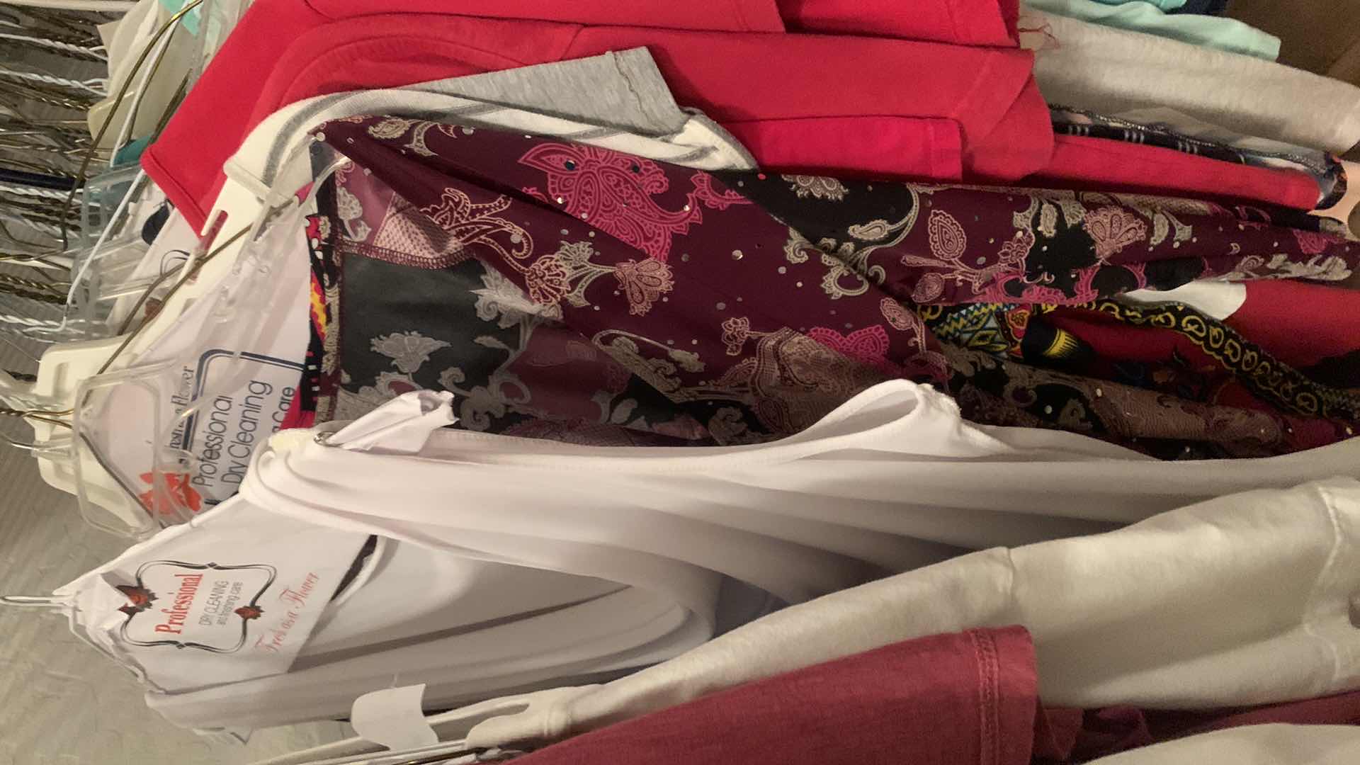 Photo 1 of HALF RACK OF WOMENS TOPS MOSTLY L XL