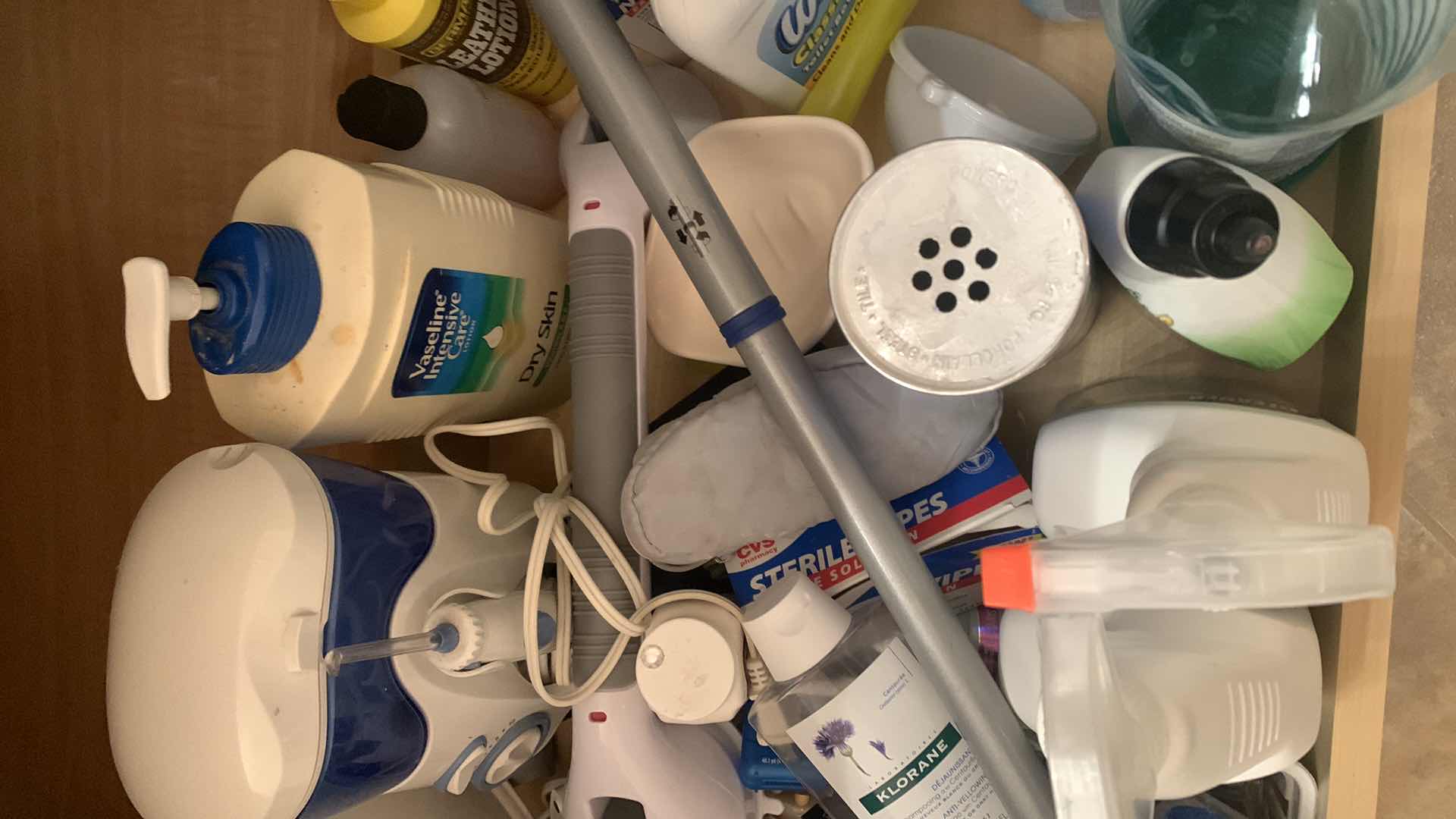 Photo 1 of CONTENTS OF BATHROOM CABINET