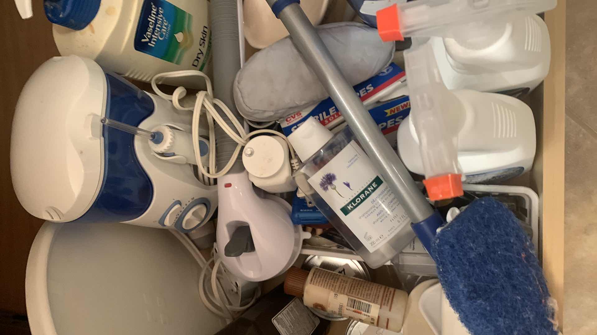 Photo 1 of CONTENTS OF BATHROOM CABINET