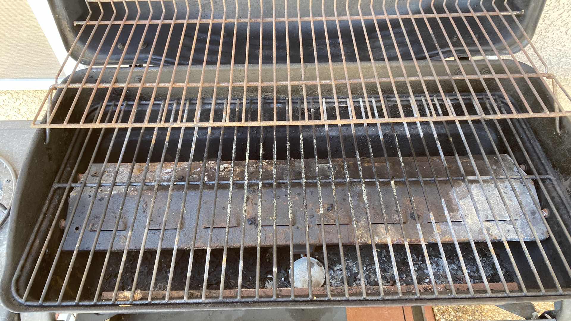 Photo 1 of KENMORE BARBECUE WITH PROPANE TANK AND BURNER ON SIDE, GRILL AREA 28” X 14” COVER INCLUDED