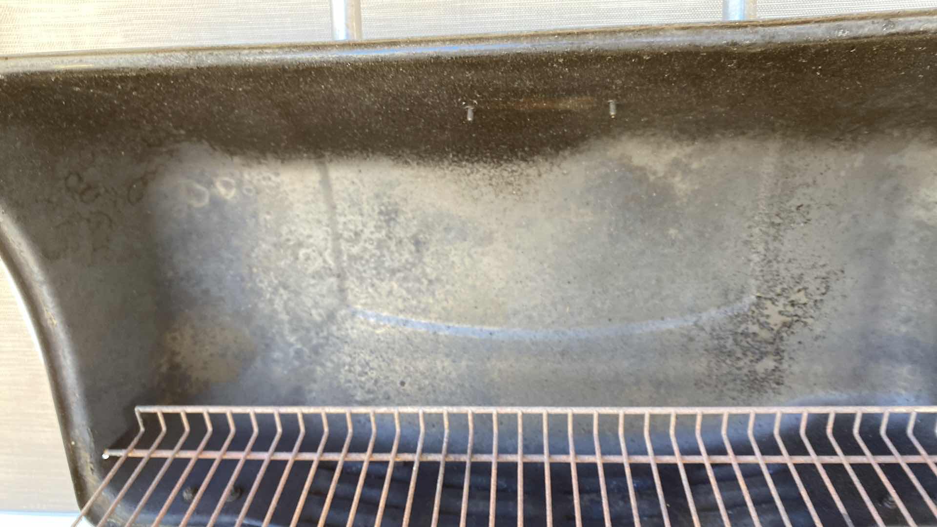 Photo 1 of KENMORE BARBECUE WITH PROPANE TANK AND BURNER ON SIDE, GRILL AREA 28” X 14” COVER INCLUDED