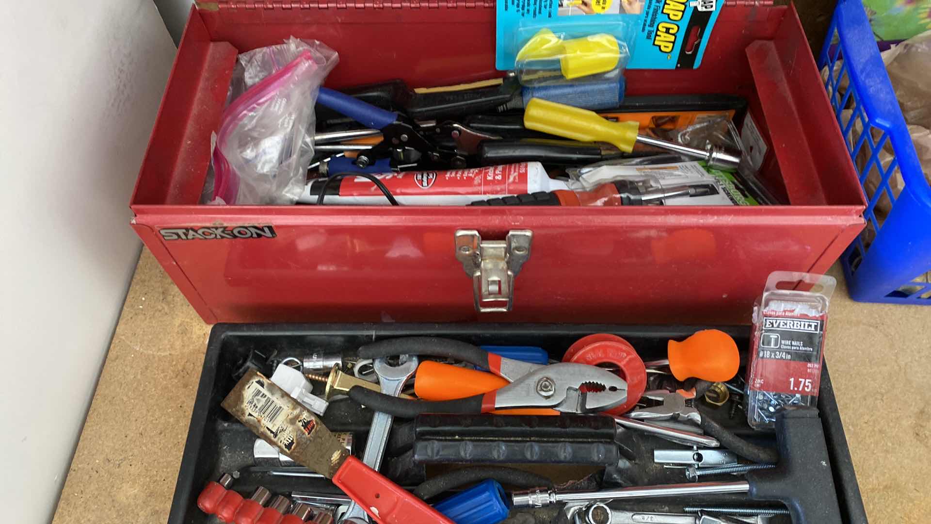 Photo 1 of TOP OF COUNTER AND ITEMS ON PEG BOARD IN GARAGE