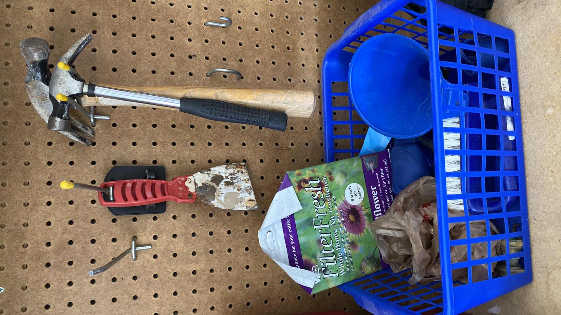 Photo 1 of TOP OF COUNTER AND ITEMS ON PEG BOARD IN GARAGE