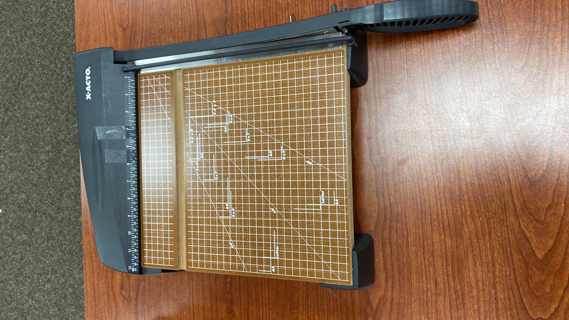 Photo 1 of ASSORTMENT OF OFFICE SUPPLIES LEGAL COPY  PAPER AND PAPER CUTTERS