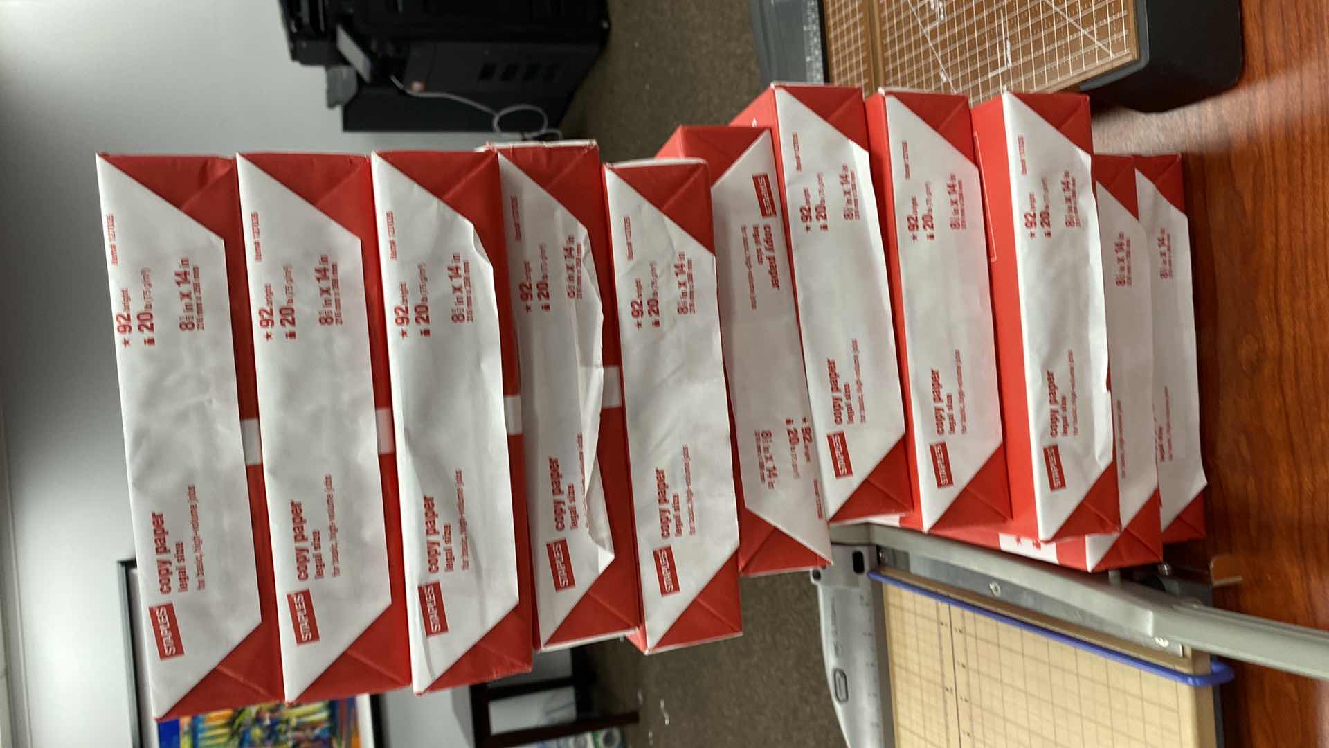 Photo 1 of ASSORTMENT OF OFFICE SUPPLIES LEGAL COPY  PAPER AND PAPER CUTTERS