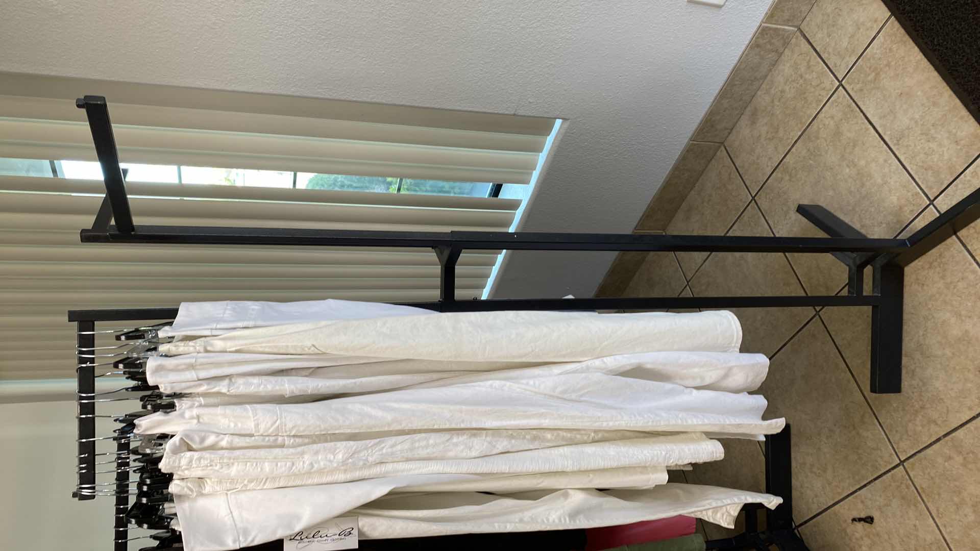 Photo 1 of ADJUSTABLE HEIGHT 3 ARM CLOTHING RACK HEIGHT RANGE 48” TO 72”