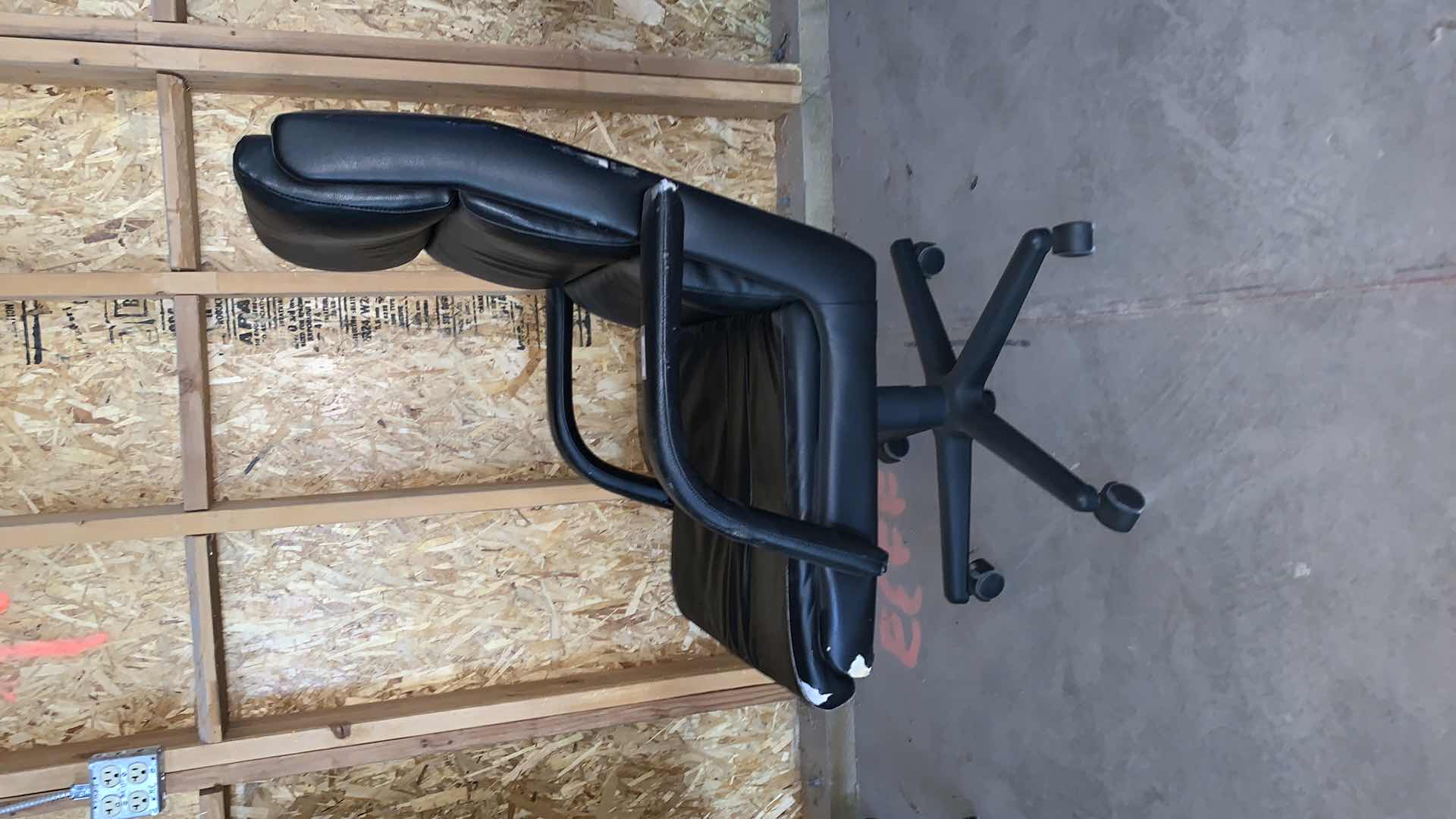 Photo 1 of BLACK BONDED LEATHER OFFICE CHAIR ON WHEELS