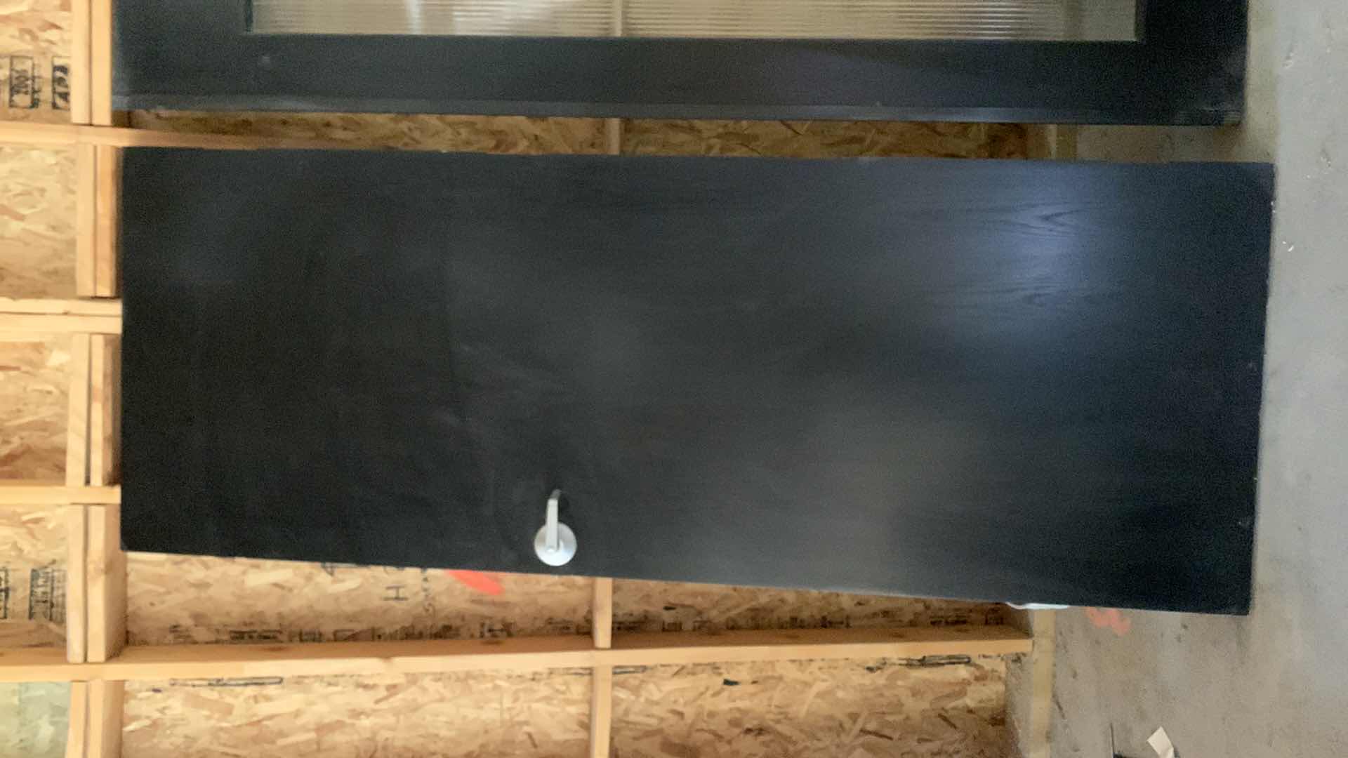 Photo 1 of BLACK WOOD GRAINED DOOR 
8' x 3'