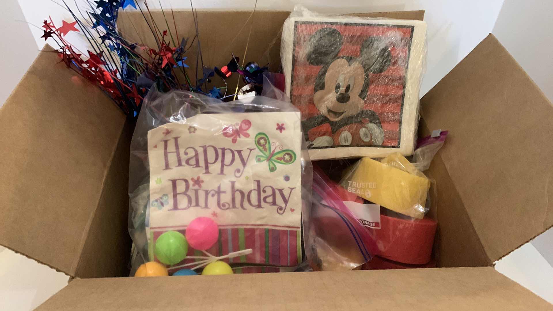 Photo 1 of BOX OF PARTY SUPPLIES