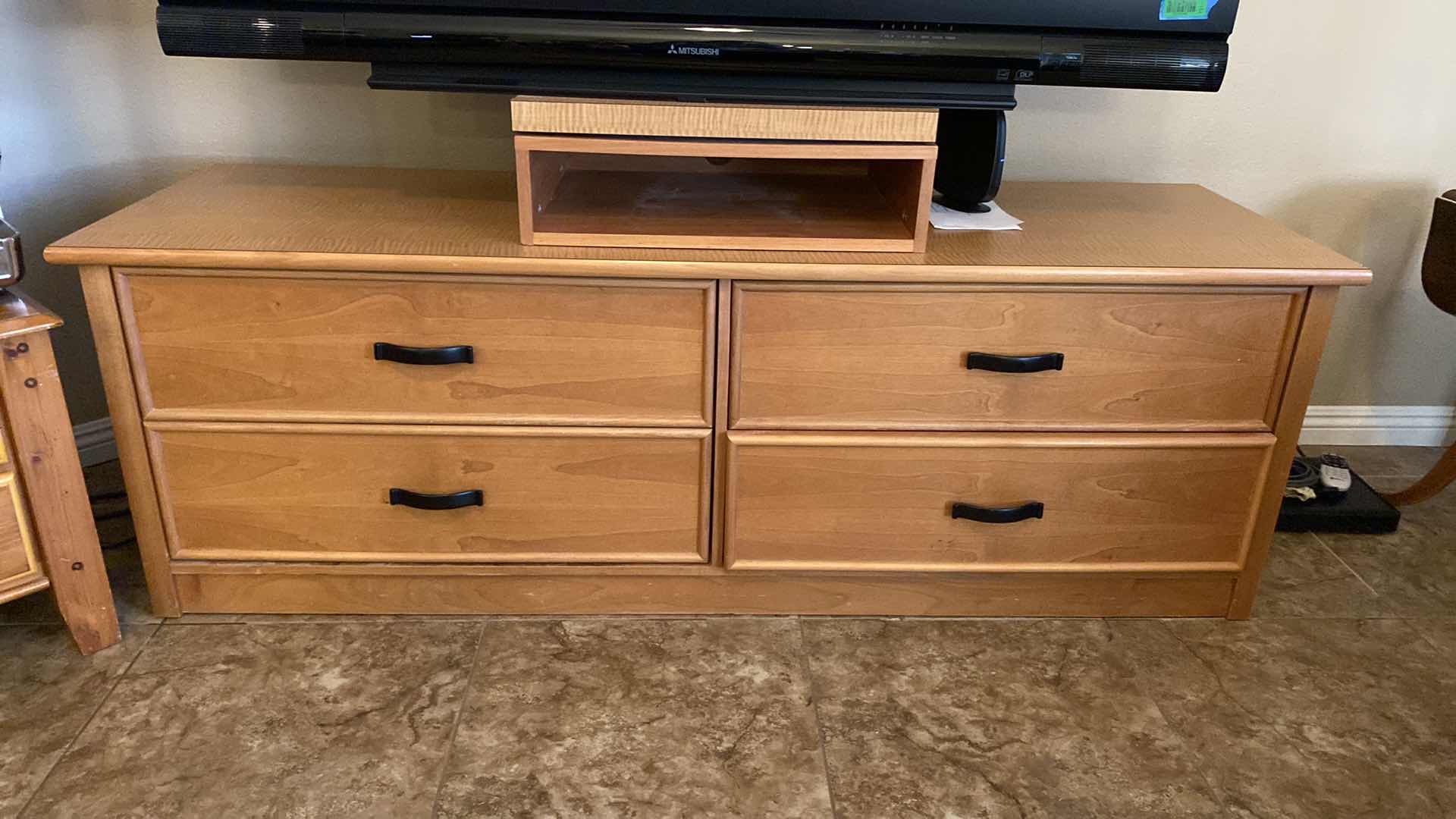 Photo 1 of 4 DRAWER WOOD TV STAND WITH SWIVEL SHELF AND COMPONENT AREA 72 X 22 H24 (TV NOT INCLUDED , CONTENTS NOT INCLUDED SOLD SEPARATELY)