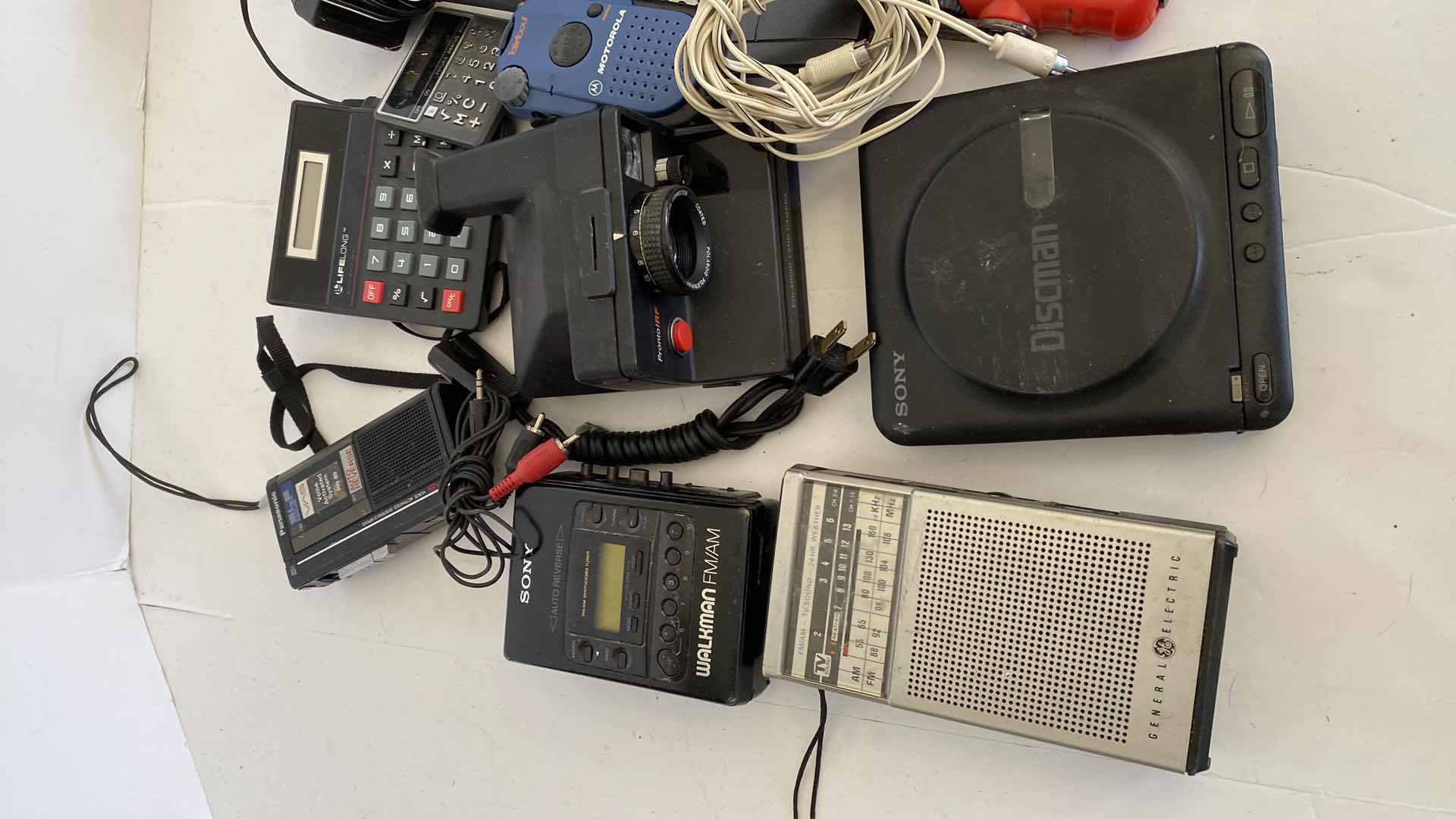 Photo 1 of ASSORTED ELECTRONIC ITEMS SONY MOTOROLA POLAROID