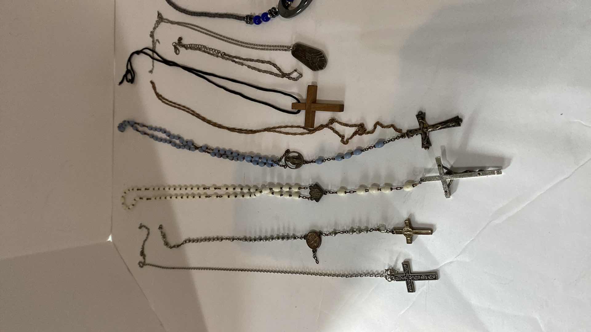 Photo 1 of ASSORTED ROSARIES AND COSTUME JEWELRY
