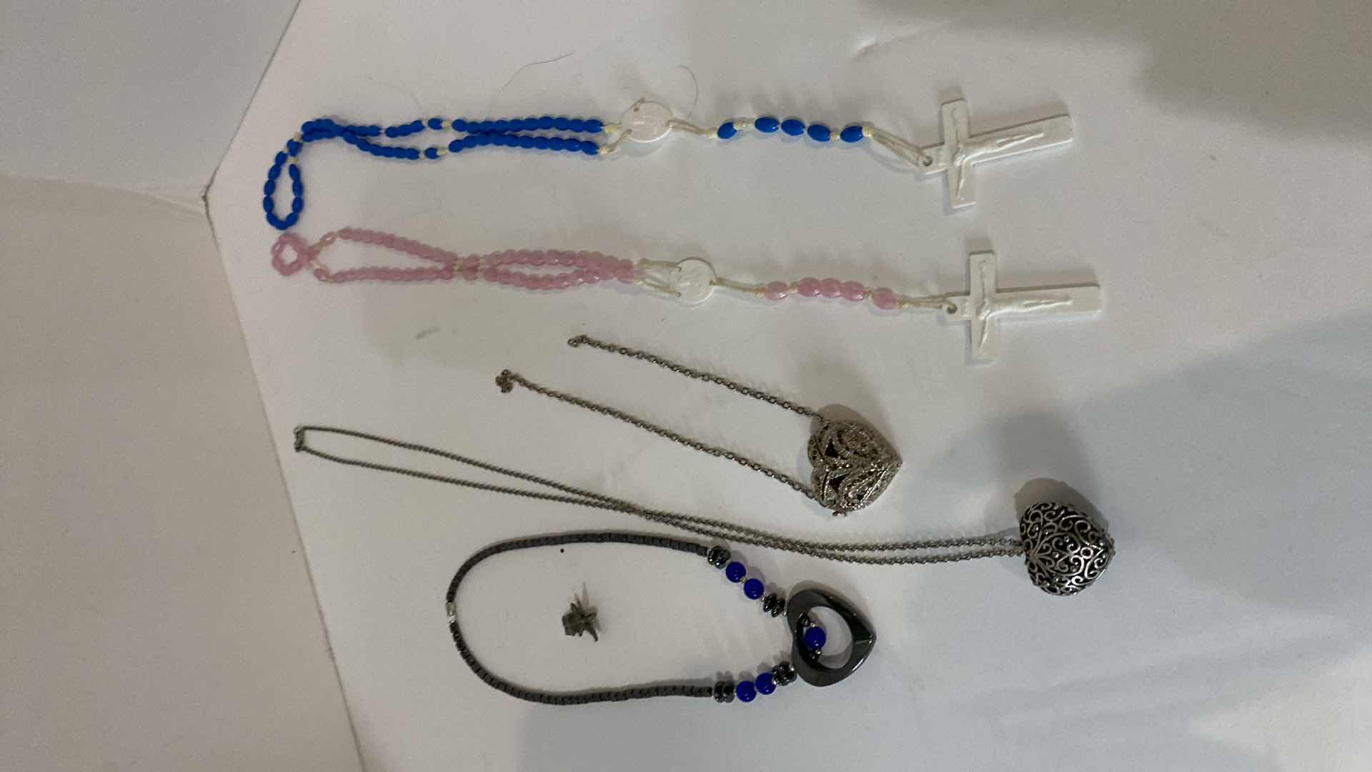 Photo 1 of ASSORTED ROSARIES AND COSTUME JEWELRY