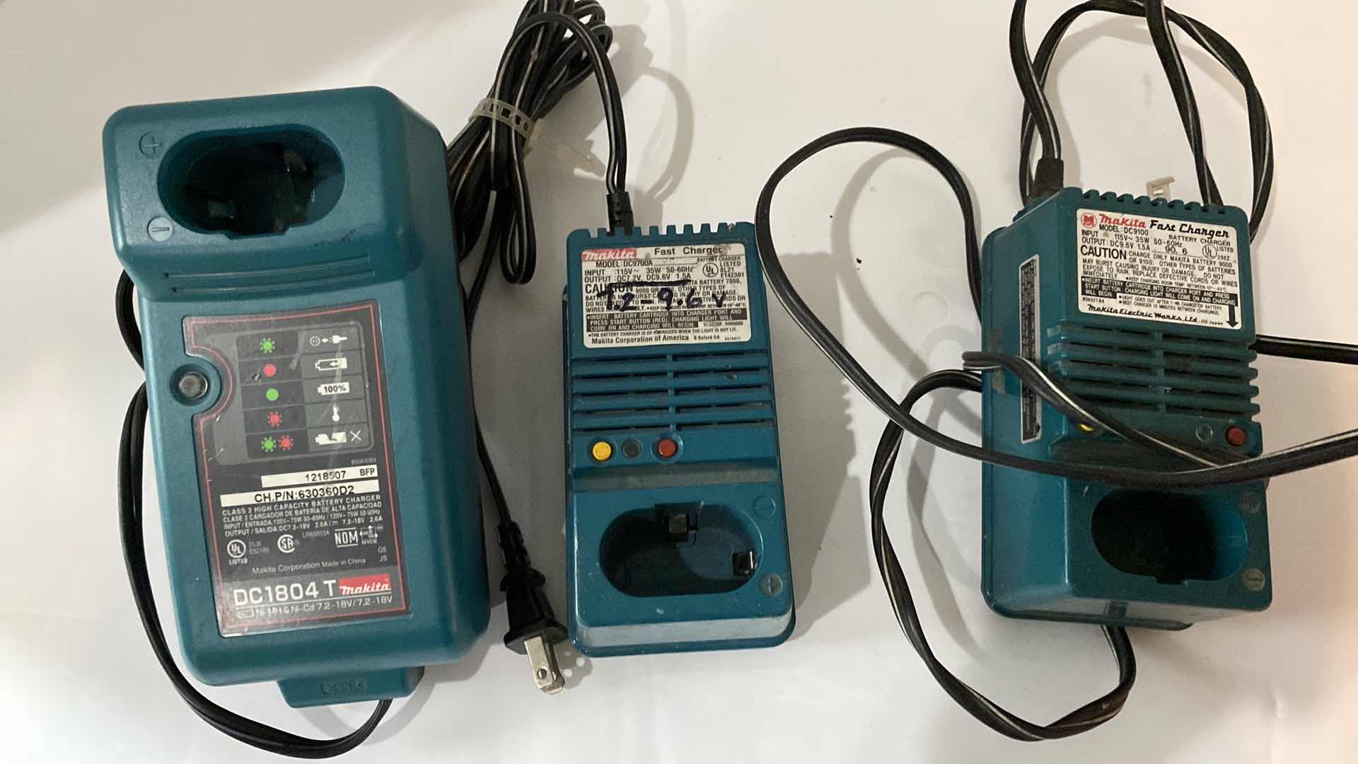 Photo 1 of 3 SAFETY VESTS AND 3 MAKITA BATTERY CHARGERS