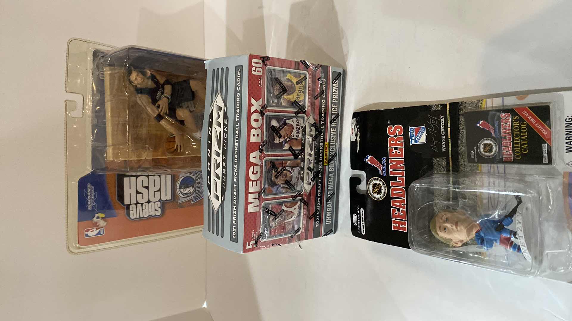 Photo 1 of 56 MEGA BOX BASKETBALL CARDS AND 2 COLLECTIBLES