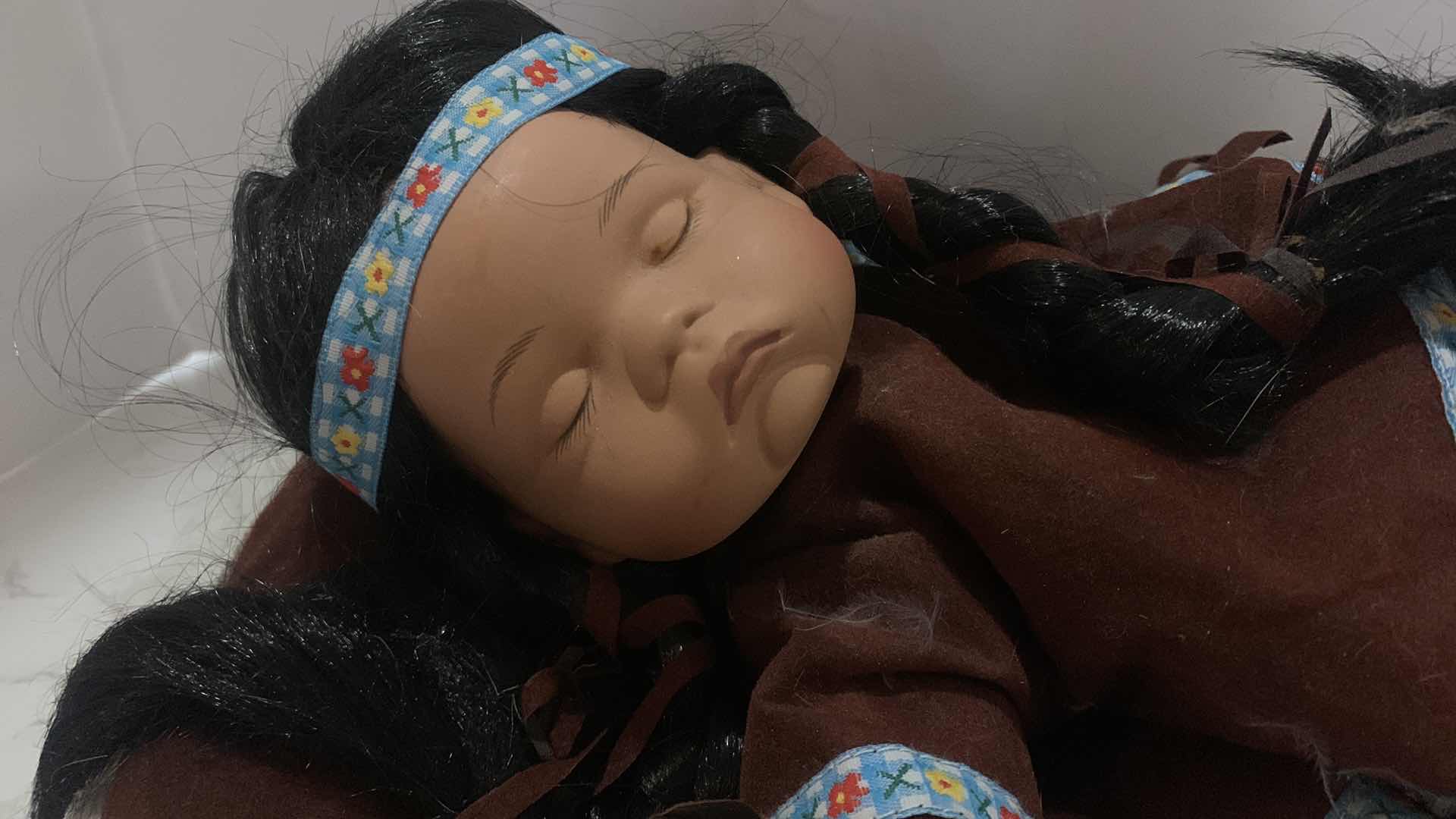 Photo 1 of COLLECTIBLE PORCELAIN INDIAN BABY DOLL w COA 12”