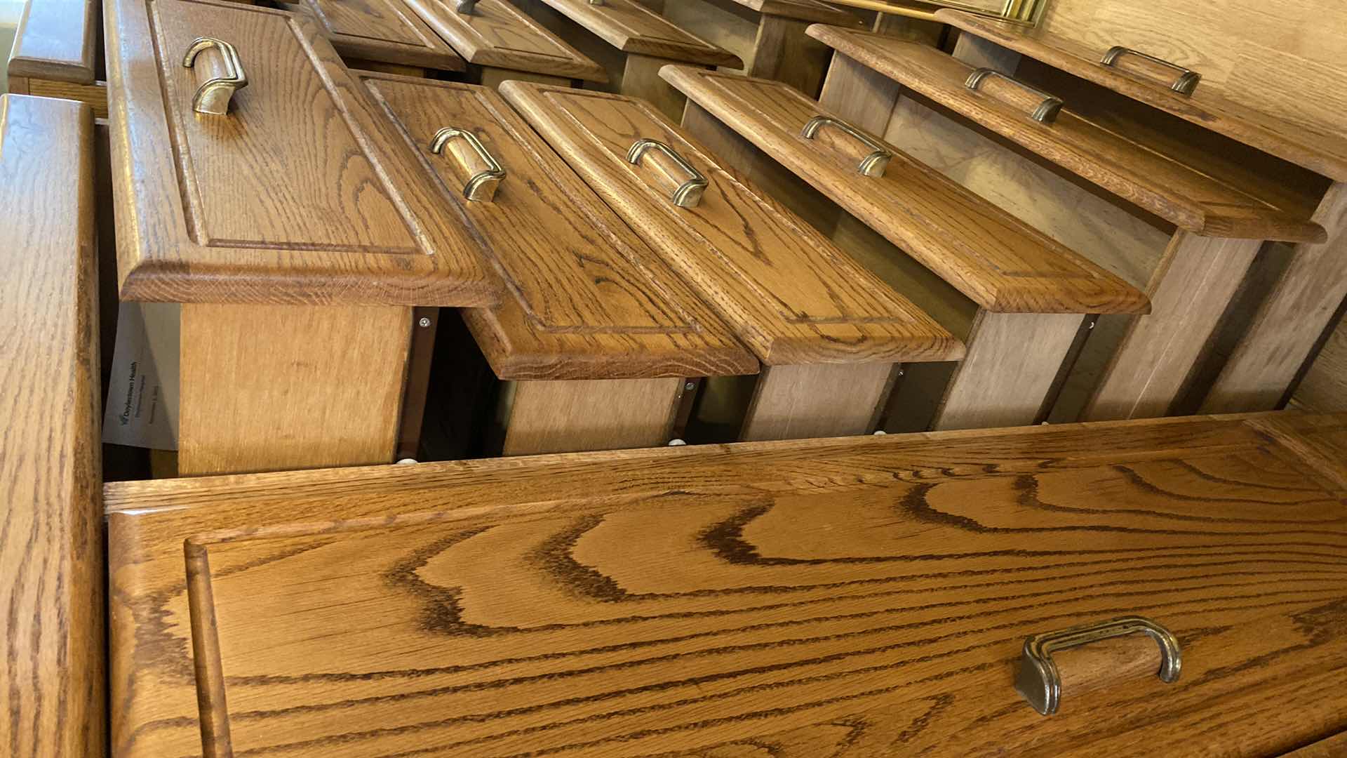 Photo 1 of OAK CHEST 7 DRAWERS AND 3 SHELFS 51” X 19” H54.5”