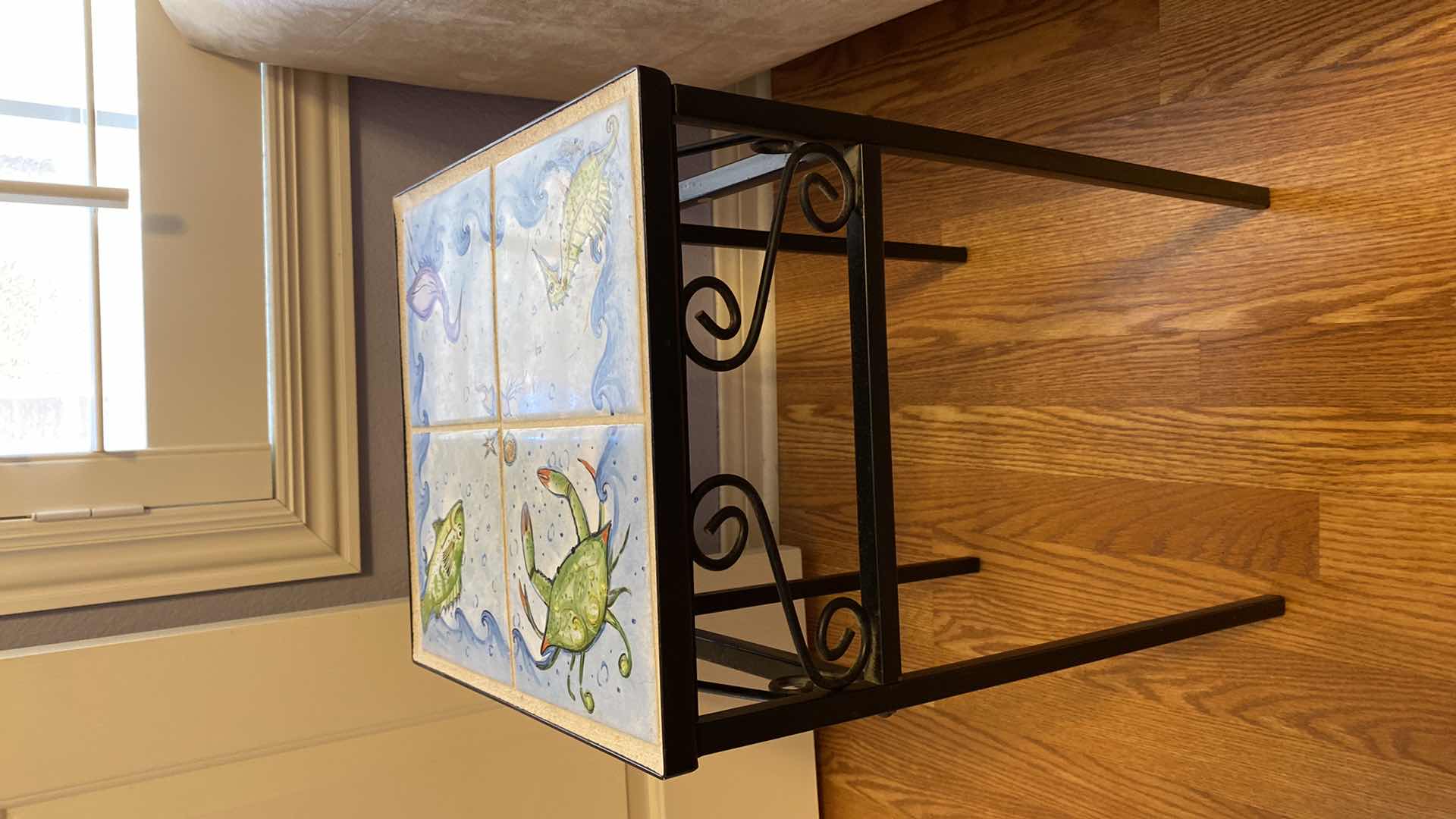 Photo 1 of TILE TOP TABLE 13” X 13” H23” AND FAUX TROPICAL PLANT