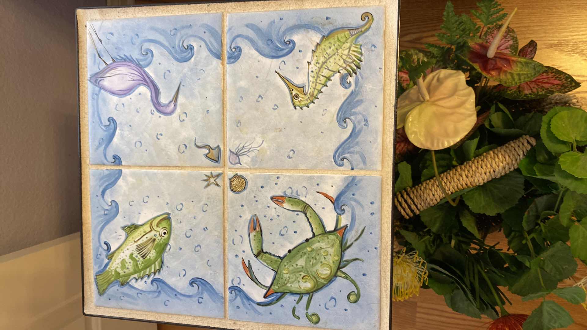 Photo 1 of TILE TOP TABLE 13” X 13” H23” AND FAUX TROPICAL PLANT