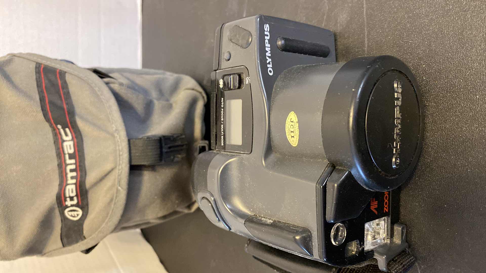 Photo 1 of OLYMPUS INFINITY SUPER ZOOM 300 CAMERA WITH CASE AND SONY CASSETTE DICTATOR