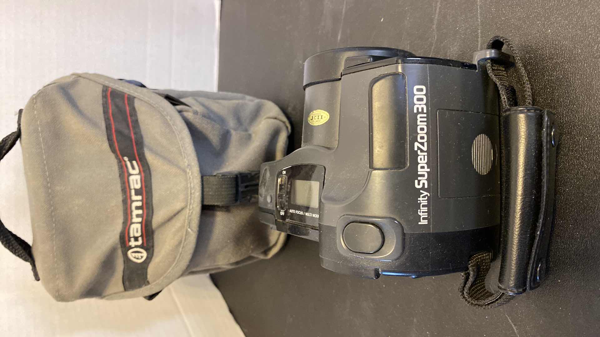 Photo 1 of OLYMPUS INFINITY SUPER ZOOM 300 CAMERA WITH CASE AND SONY CASSETTE DICTATOR