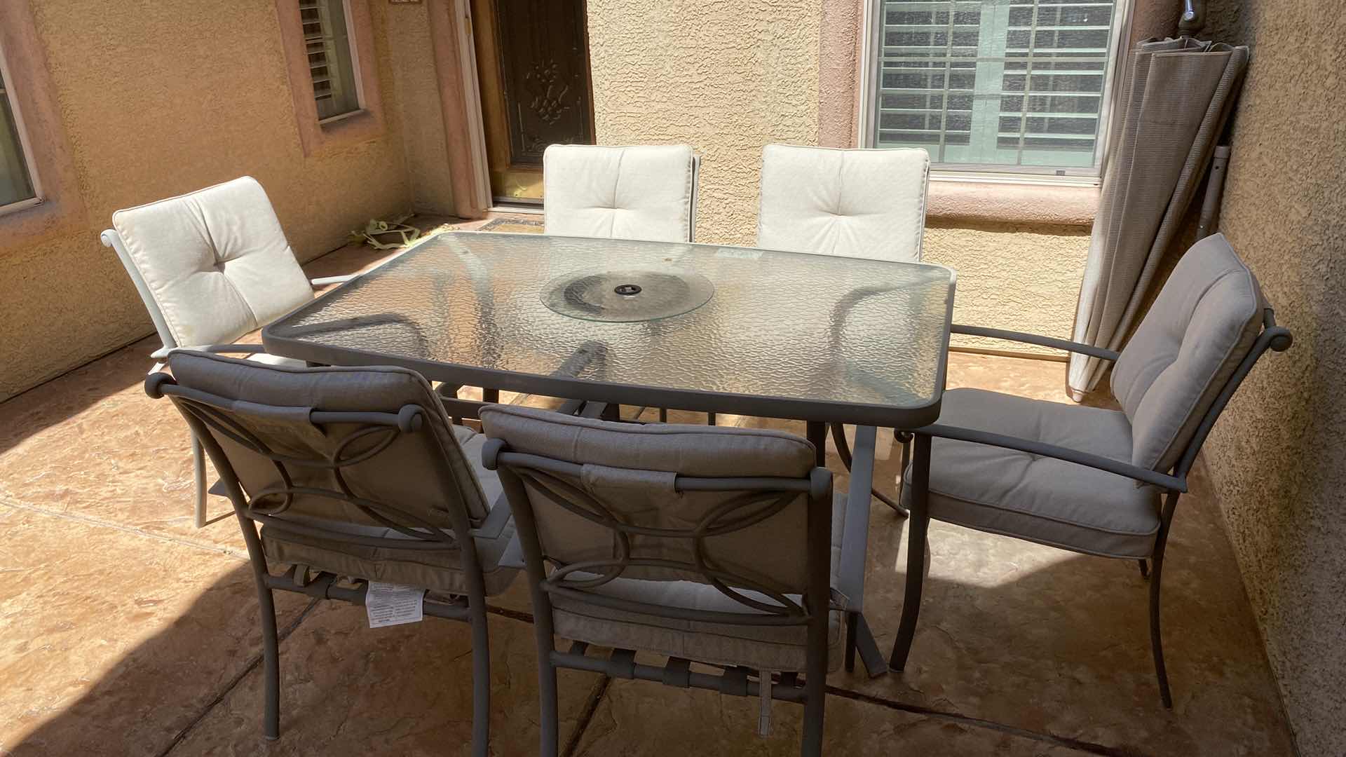 Photo 1 of 7 PIECE ALUMINUM AND GLASS PATIO TABLE WITH 6 CHAIRS 62” X 40” (CUSHIONS INCLUDED)