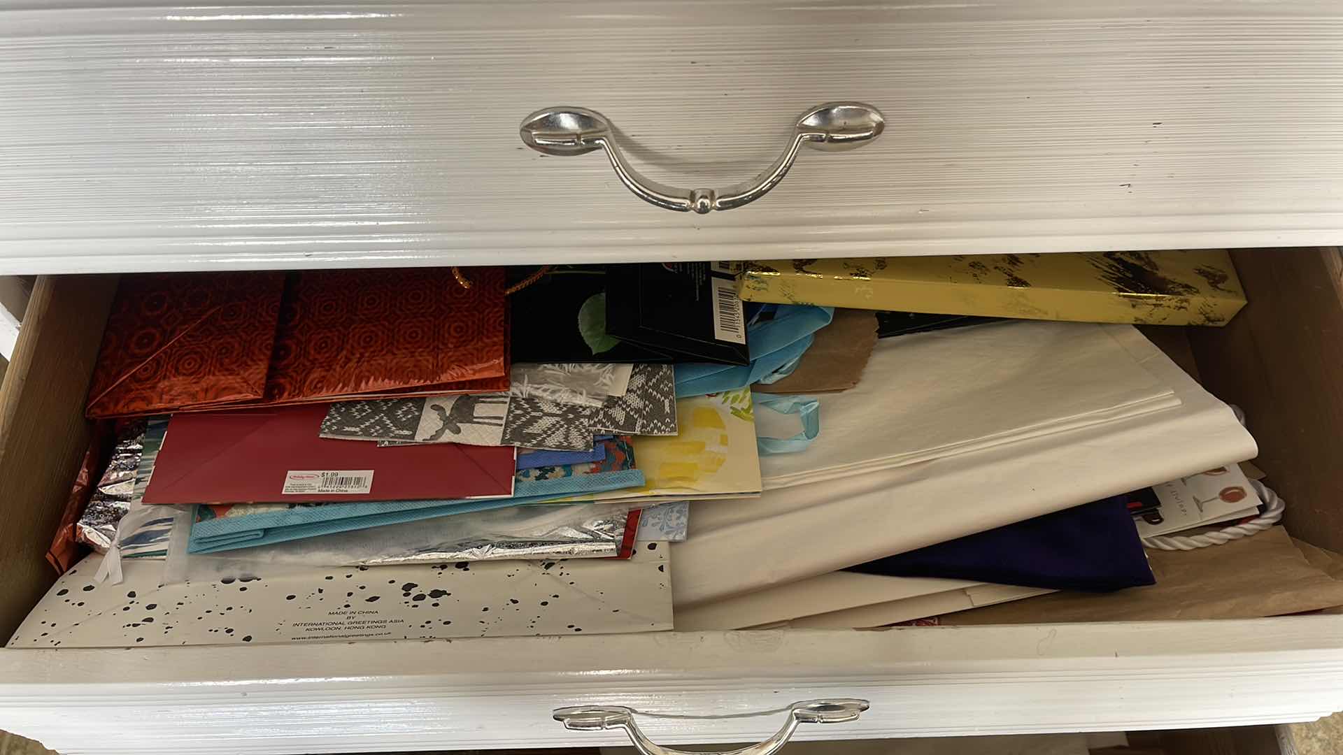 Photo 1 of WOOD BASE 4 DRAWER DRESSER 30” X 17” H39”(CONTENTS INCLUDED)