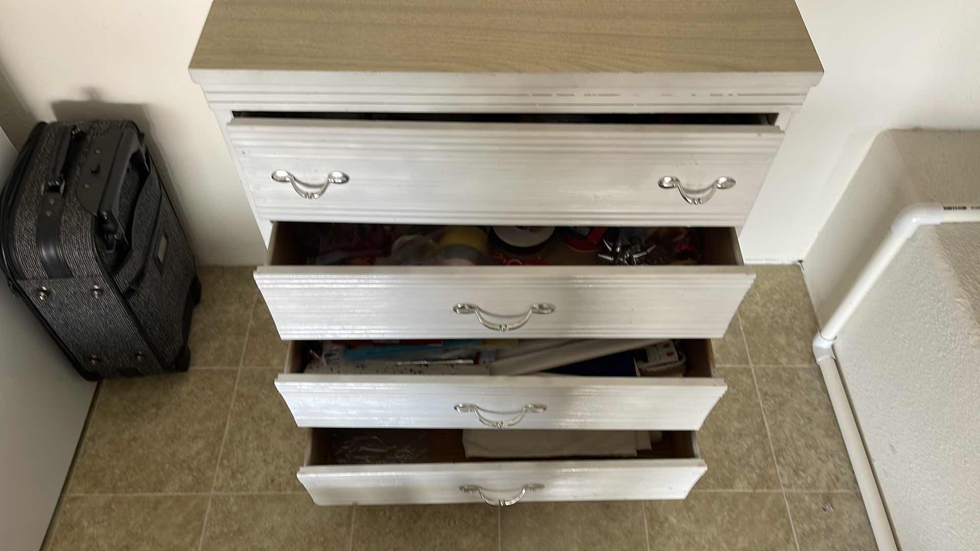 Photo 1 of WOOD BASE 4 DRAWER DRESSER 30” X 17” H39”(CONTENTS INCLUDED)