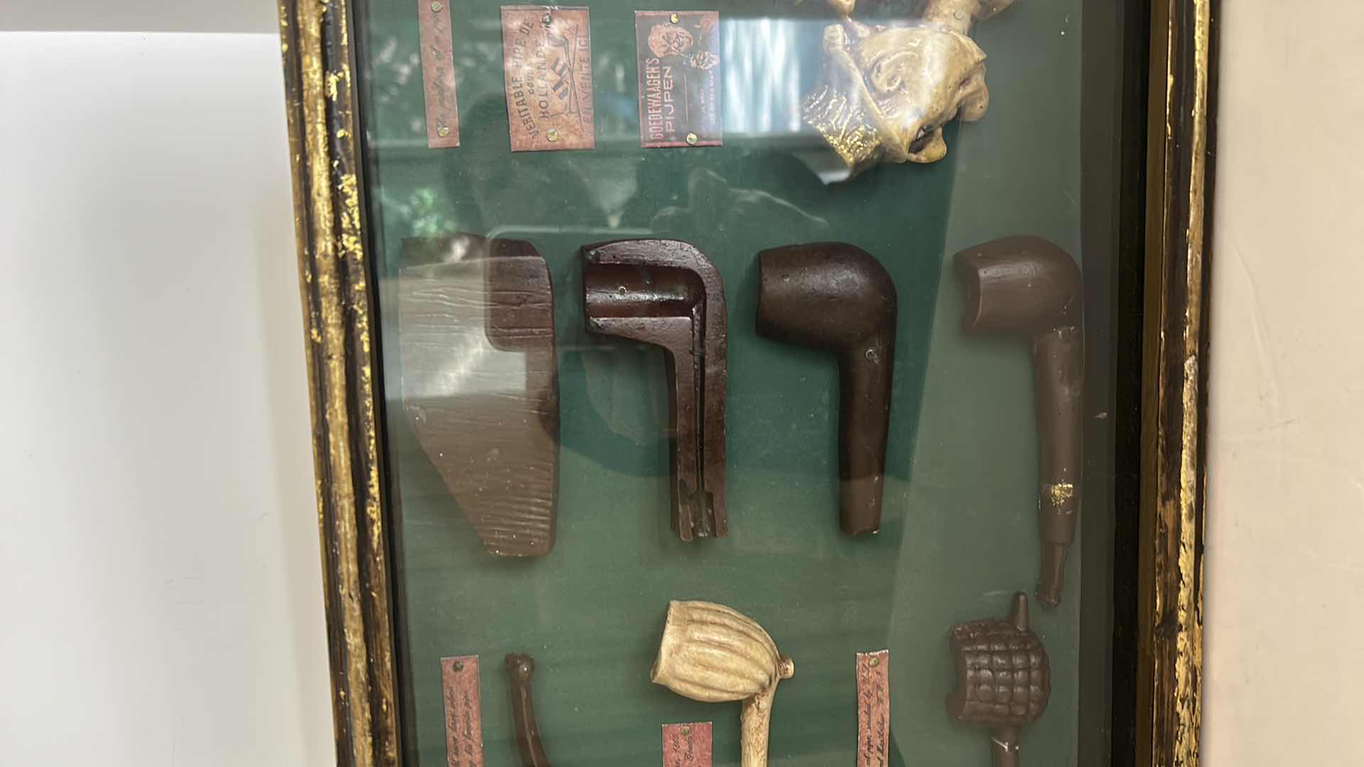 Photo 4 of DISTRESSED BLACK AND GOLD FRAMED SHADOW BOX WITH VINTAGE PIPES 20.5” x 11.25”