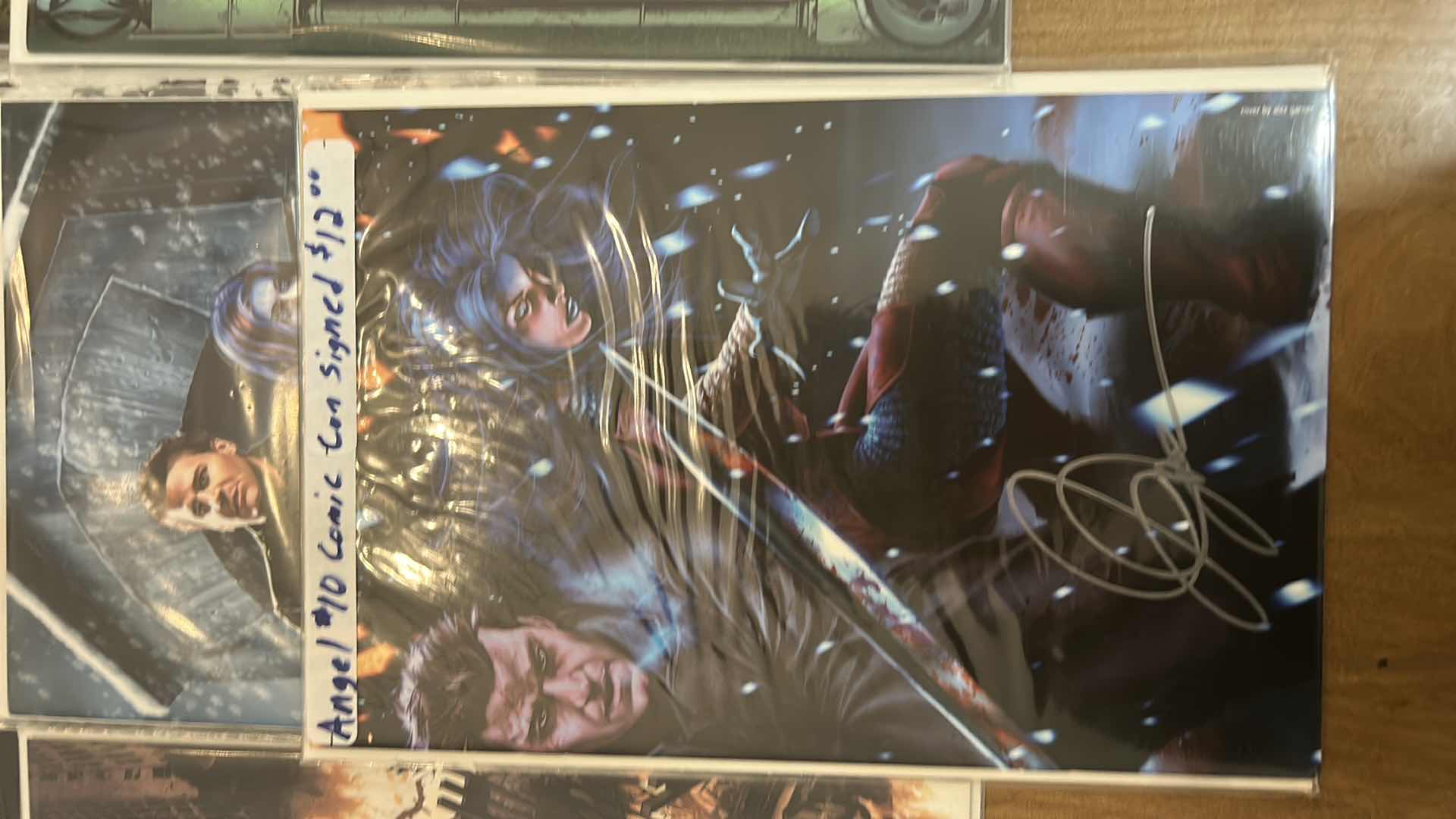 Photo 1 of 10 - ANGEL COMIC BOOKS ( 1 SIGNED)