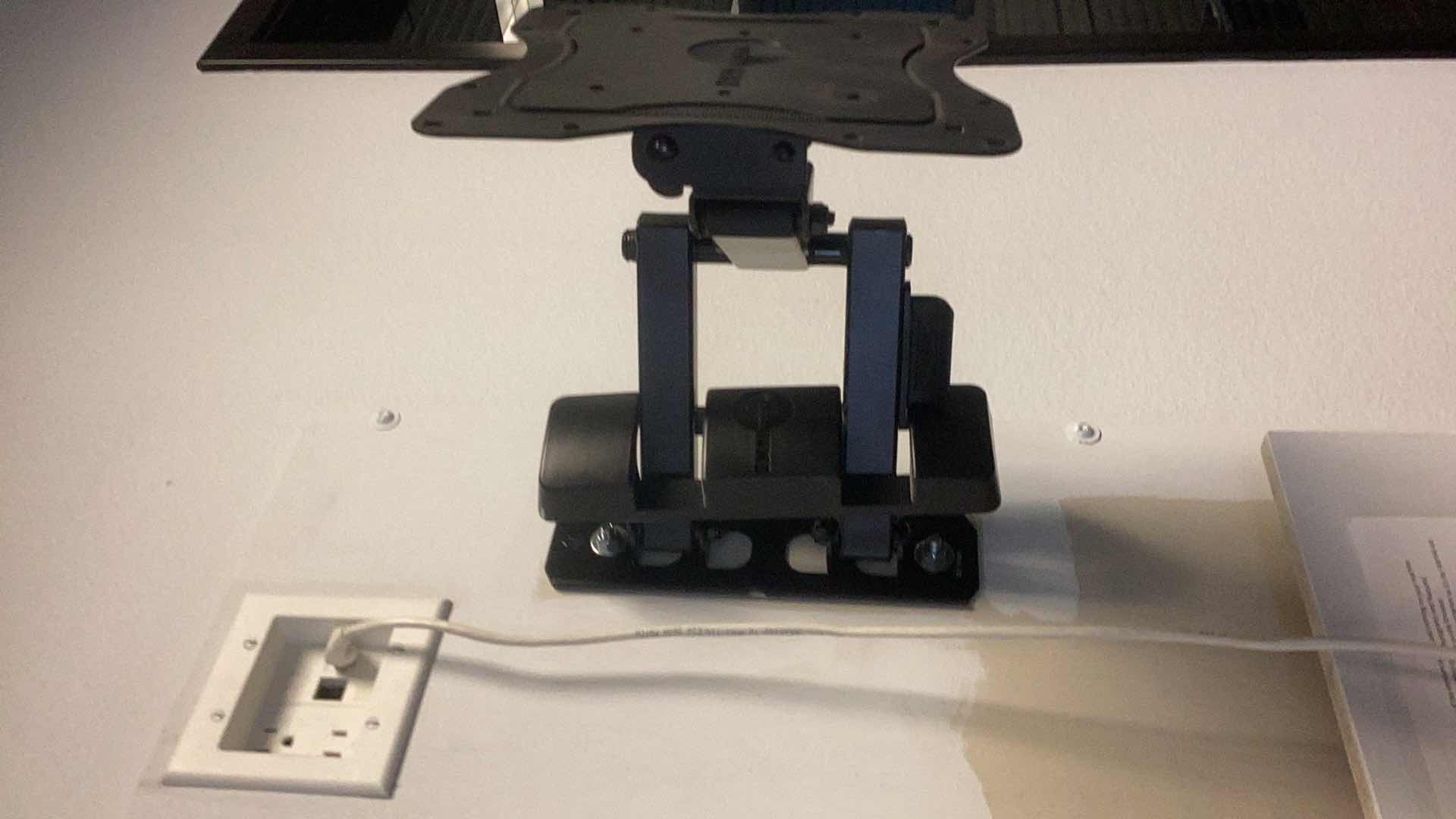 Photo 1 of T.V. MOUNT