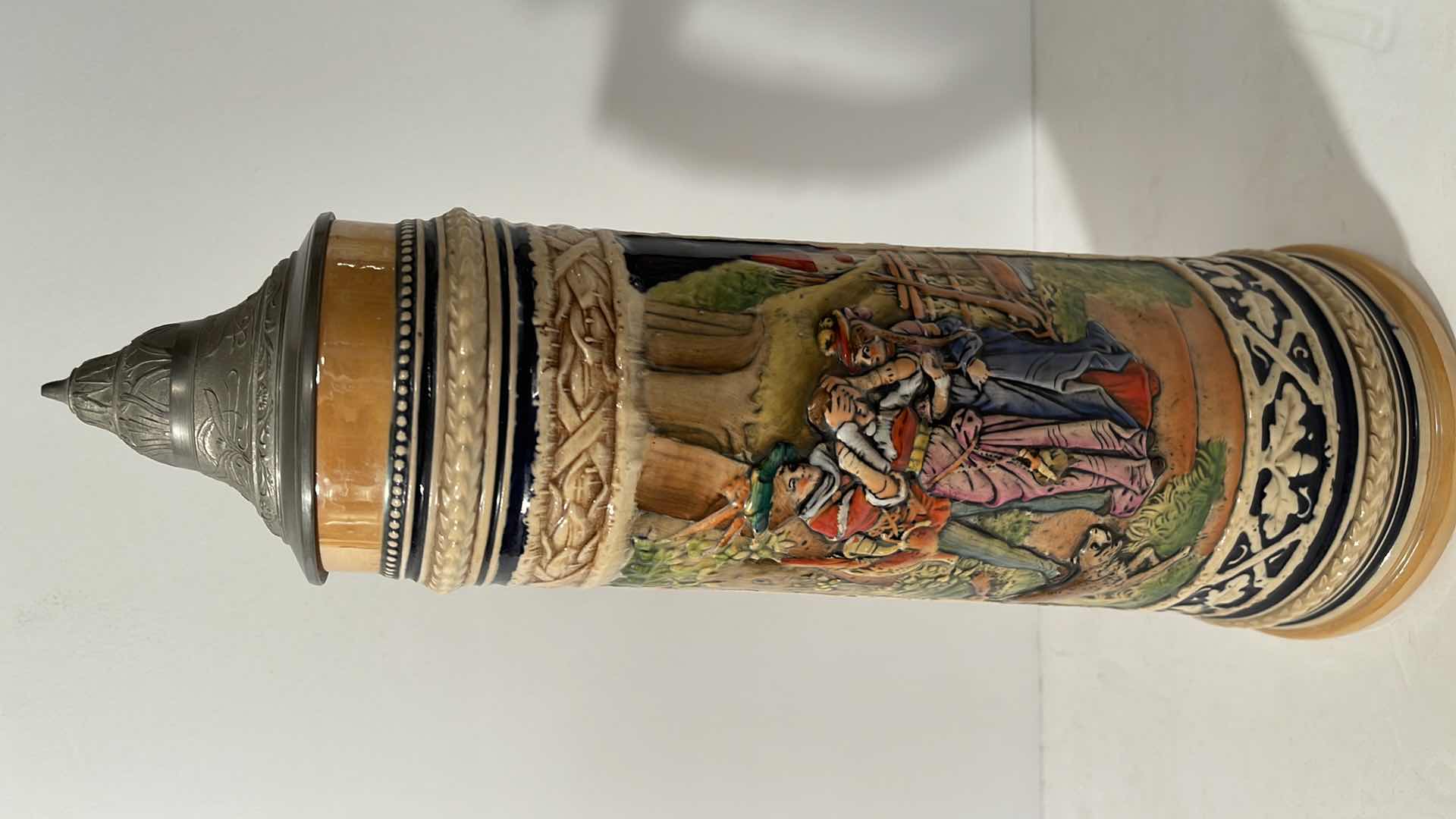 View 1 of GERMAN BEER STEIN, 1 1/2 LT., GERZ #1519, WEST GERMANY, LANDESKNECHT HUNTER WITH DISDRESSED SWEETHEART H-14”