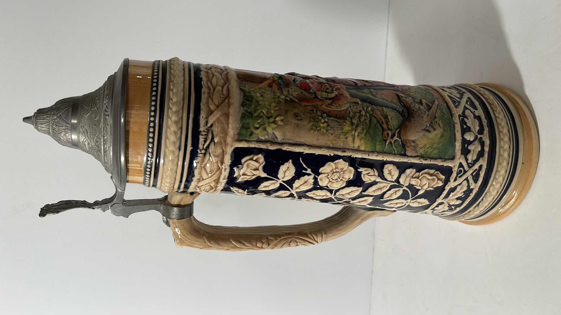 View 5 of GERMAN BEER STEIN, 1 1/2 LT., GERZ #1519, WEST GERMANY, LANDESKNECHT HUNTER WITH DISDRESSED SWEETHEART H-14”