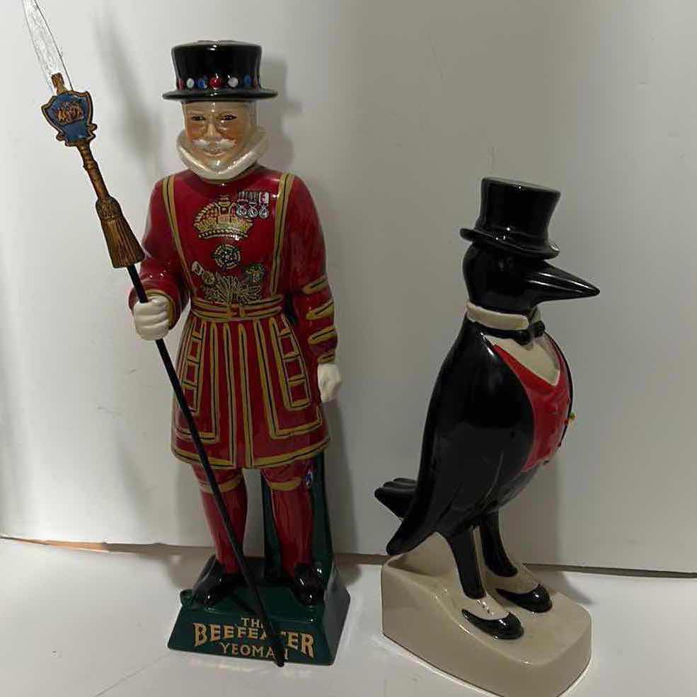 Photo 1 of COLLECTIBLE PORCELAIN LIQUOR BOTTLES TALLEST 18.5”