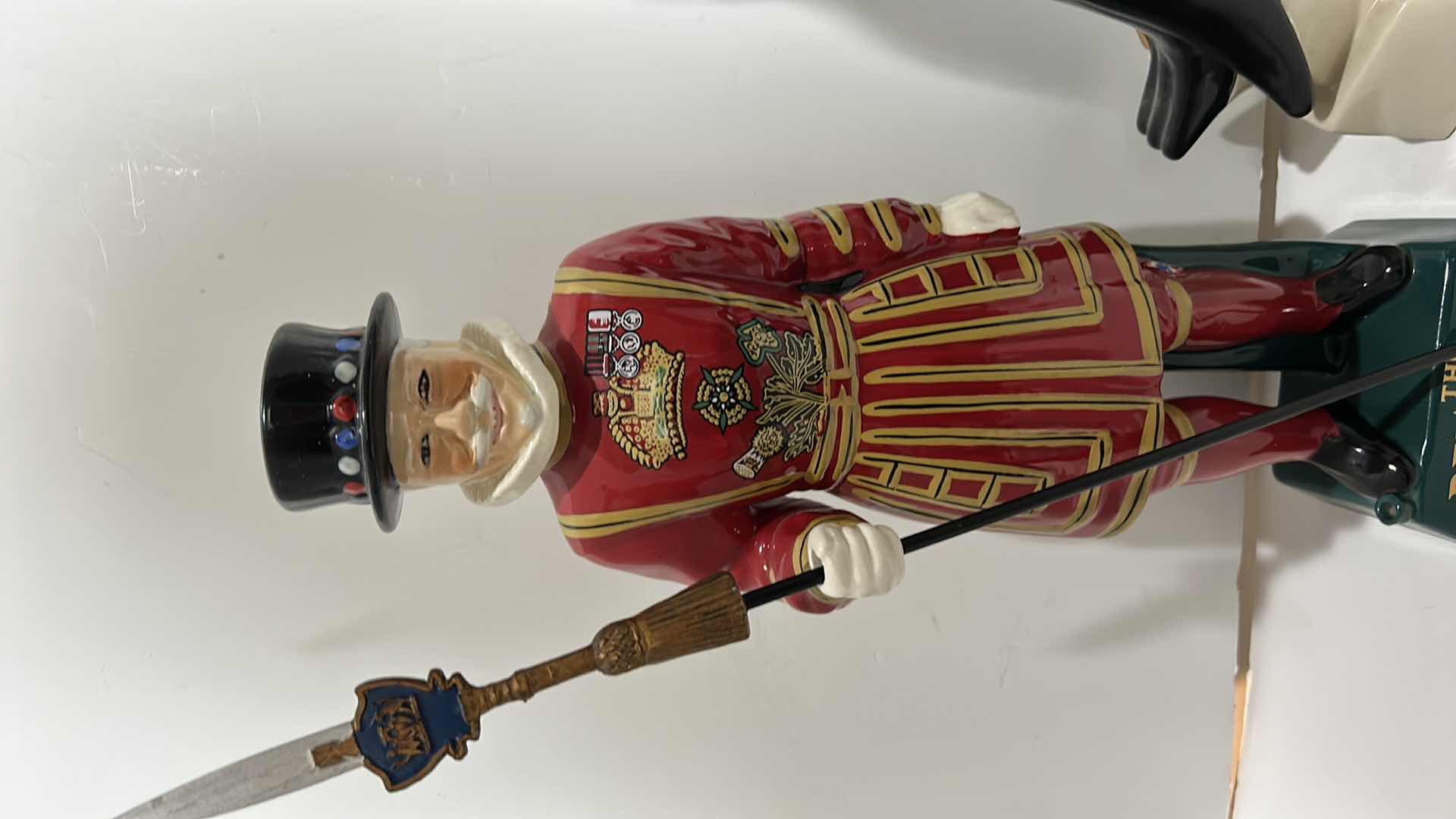 Photo 2 of COLLECTIBLE PORCELAIN LIQUOR BOTTLES TALLEST 18.5”