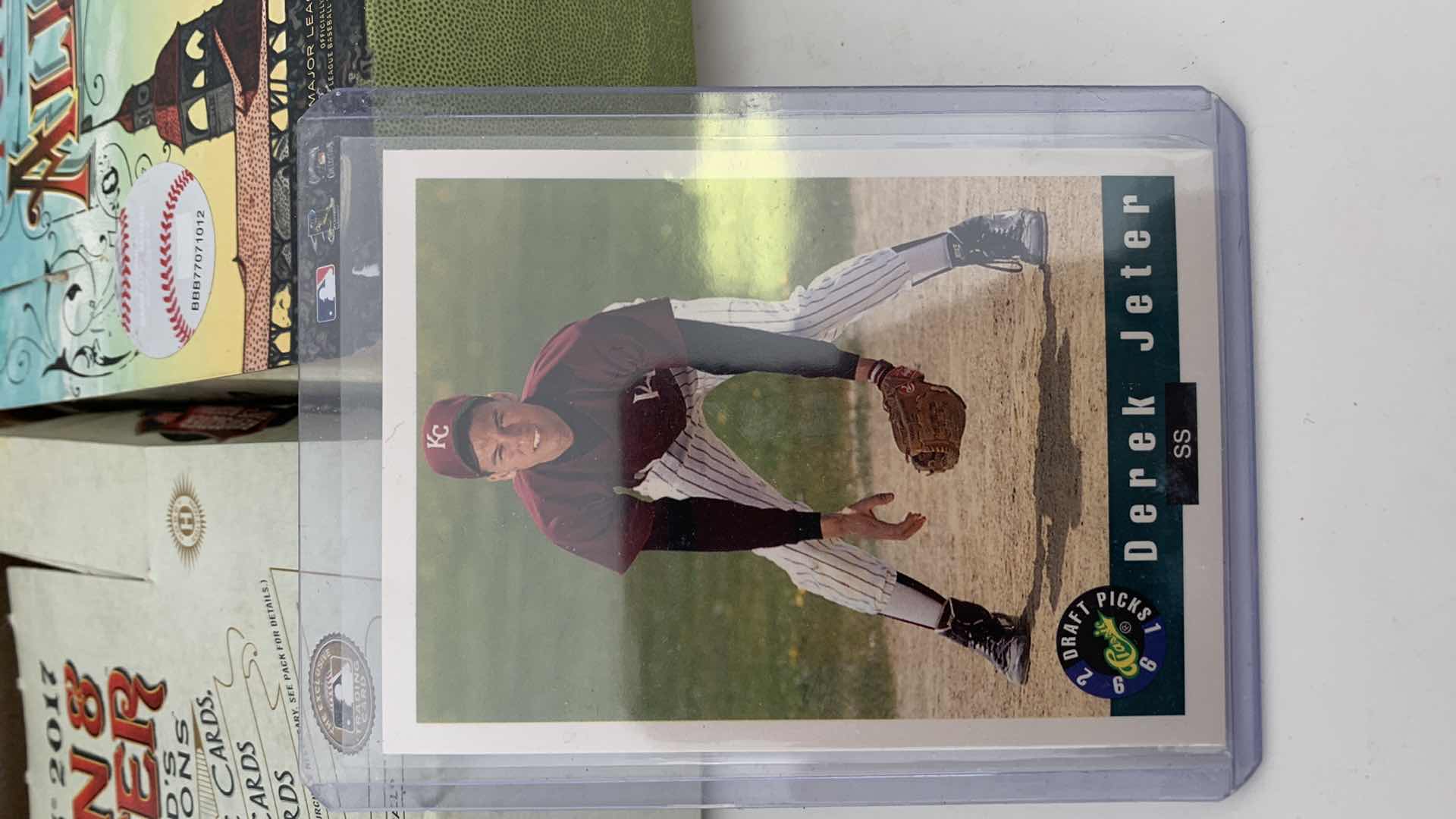 Photo 1 of MLB BASEBALL CARDS DETEK JETER ROOKIE CAL RIPKEN FOOTBALL UNCUT ROOKIES