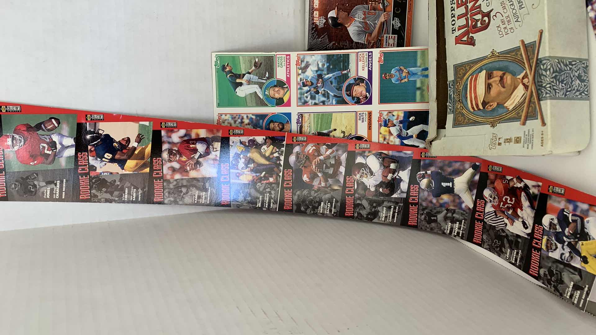 Photo 1 of MLB BASEBALL CARDS DETEK JETER ROOKIE CAL RIPKEN FOOTBALL UNCUT ROOKIES