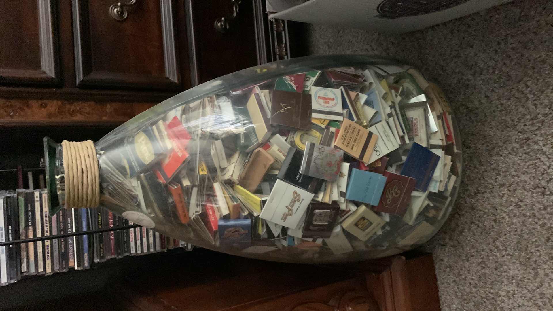 Photo 1 of LARGE GLASS VASE FULL OF MATCHES 27” TALL