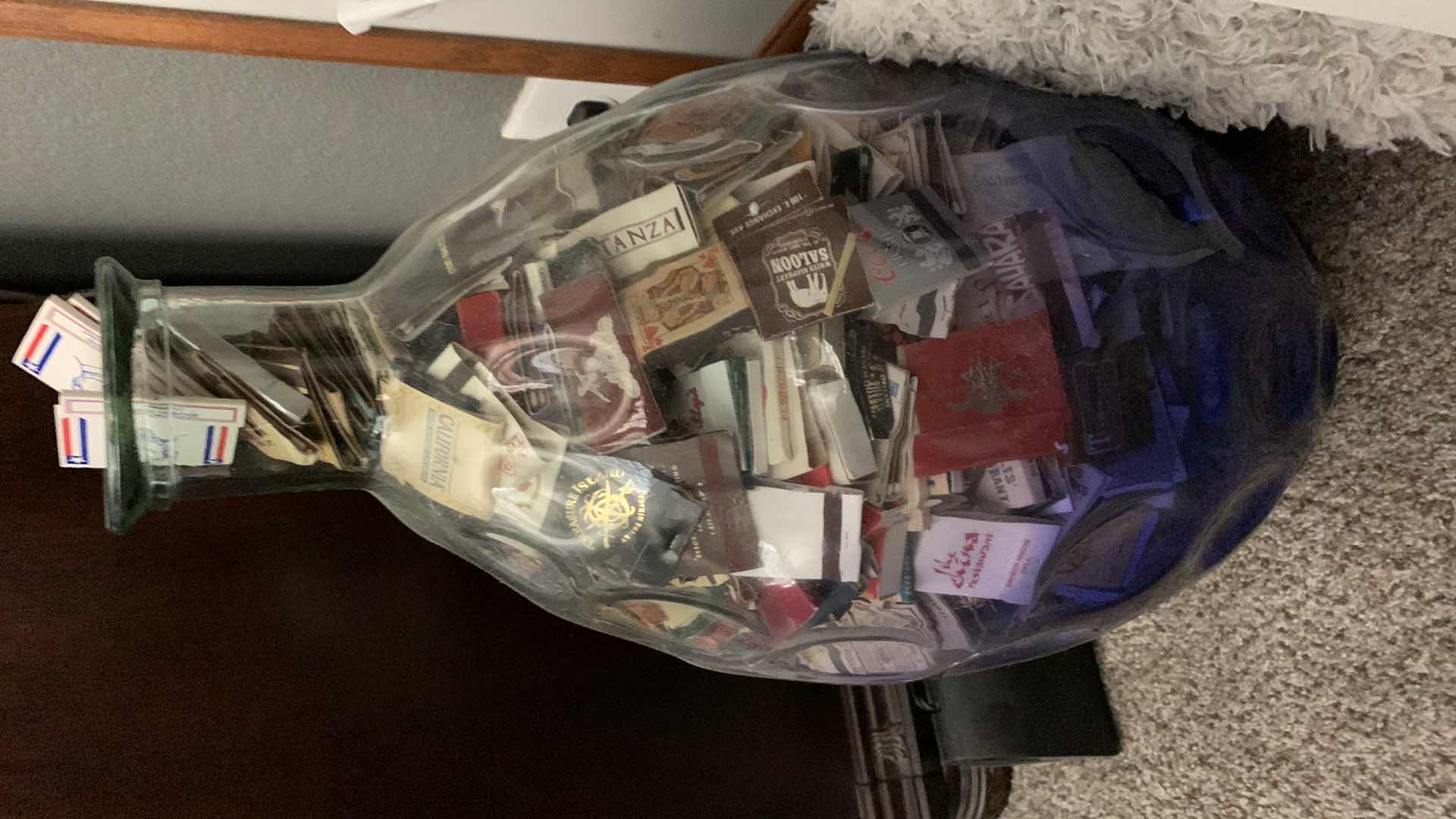 Photo 1 of LARGE GLASS VASE FULL OF MATCHES 27” TALL