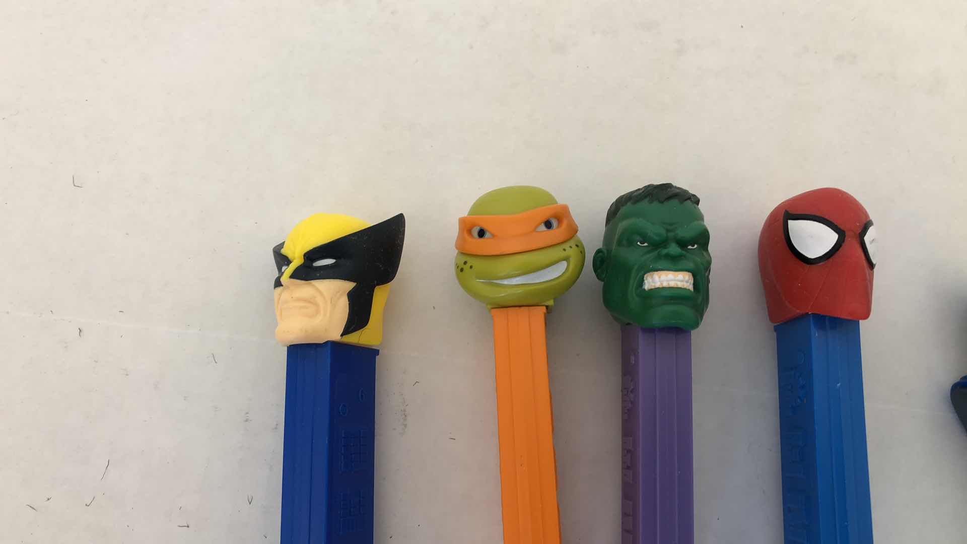 Photo 1 of COMIC CHARACTERS PEZ DISPENSERS